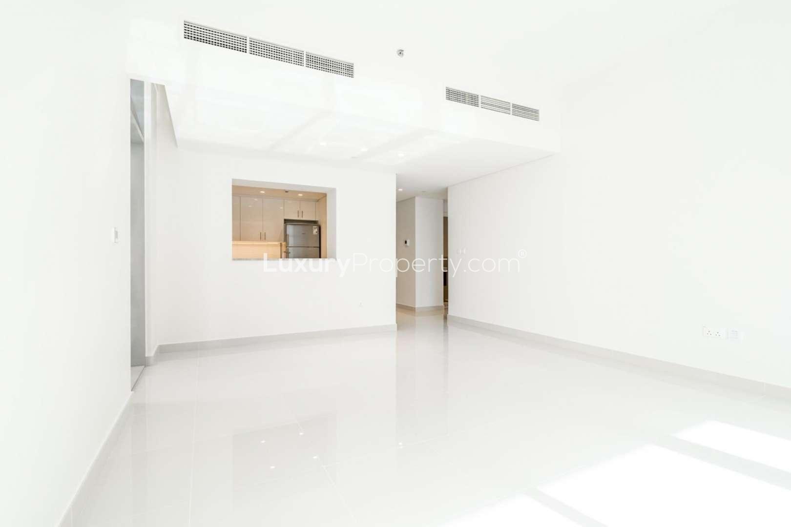 Spacious living room with floor-to-ceiling windows in BLVD Crescent, Downtown Dubai apartment