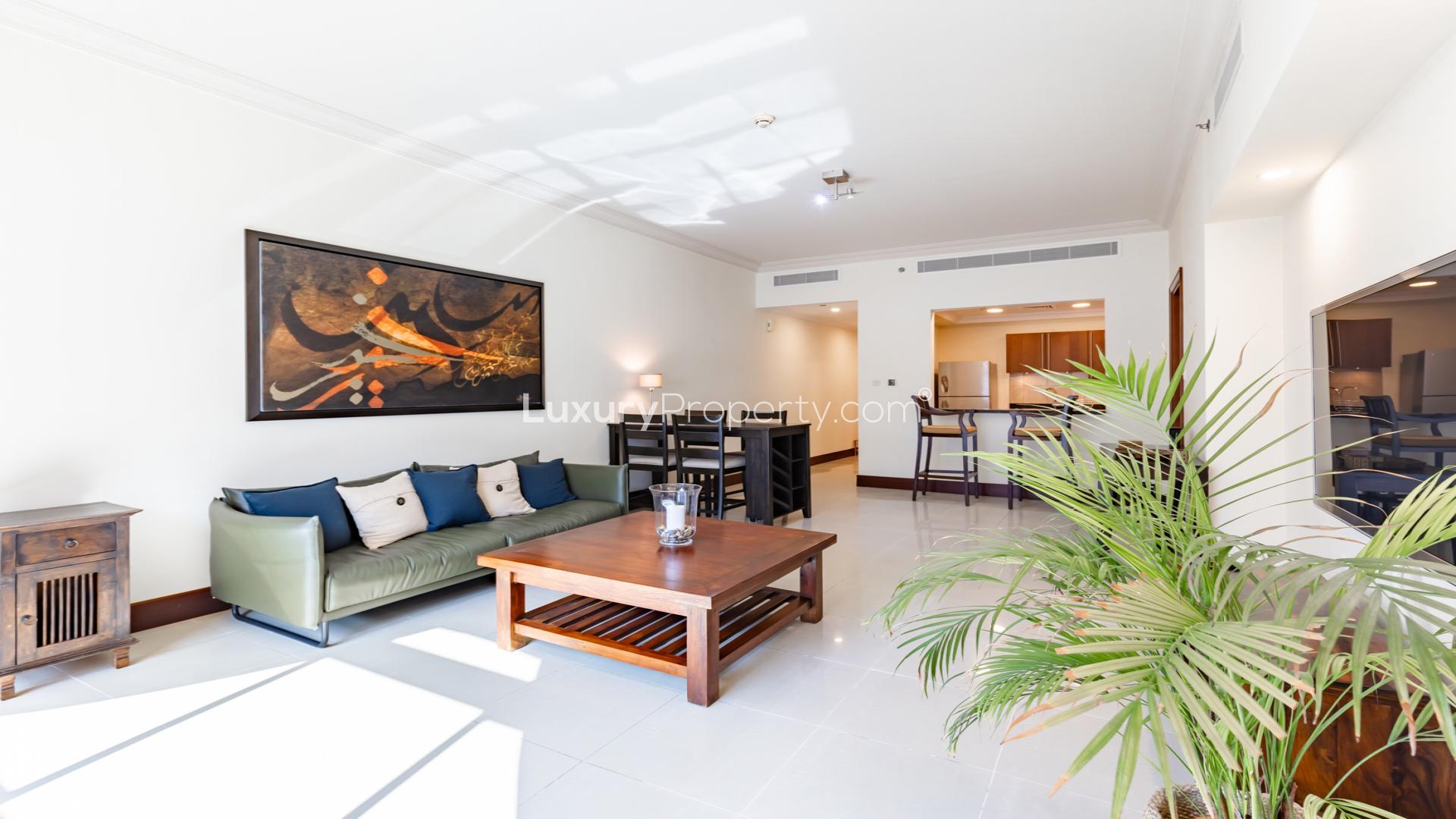 High-floor Palm Jumeirah apartment living room with modern decor and natural light