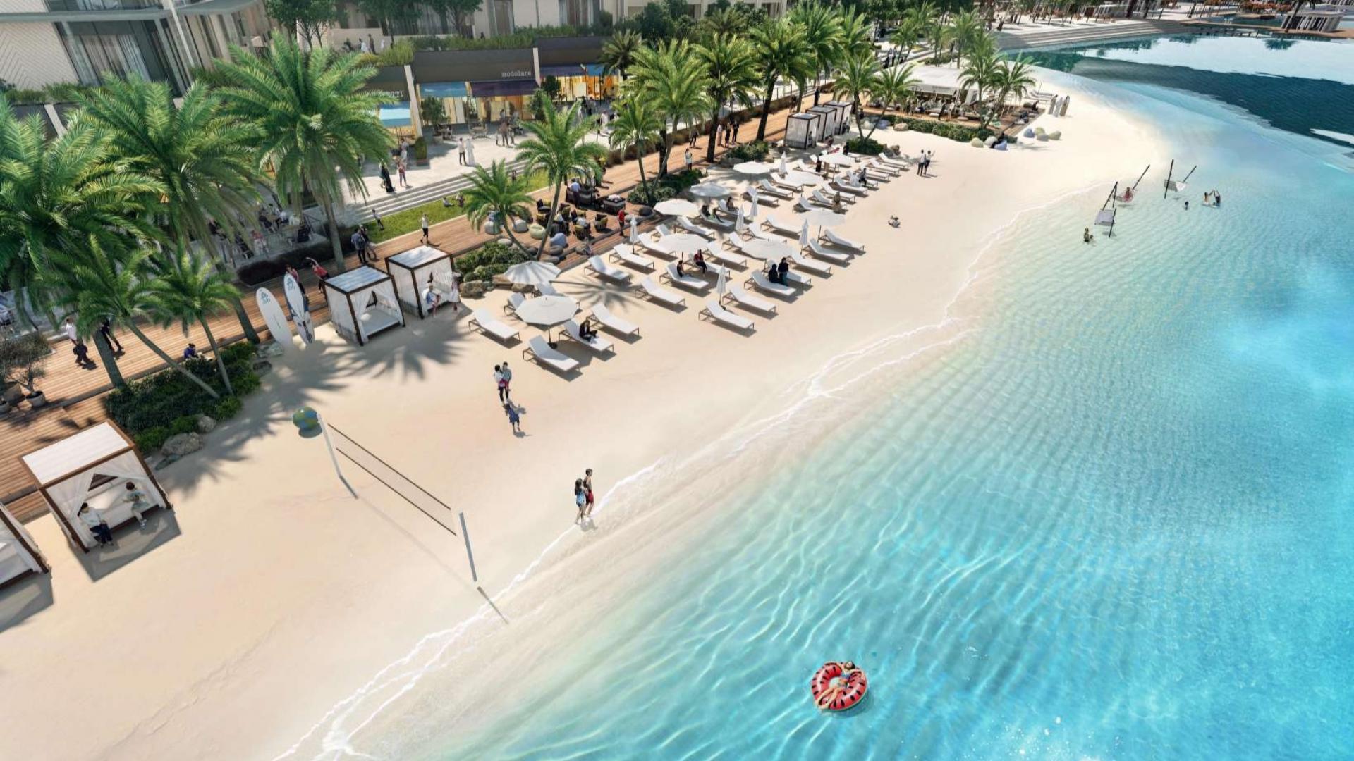 Modern bedroom in Breeze at Dubai Creek Harbour apartment with balcony view