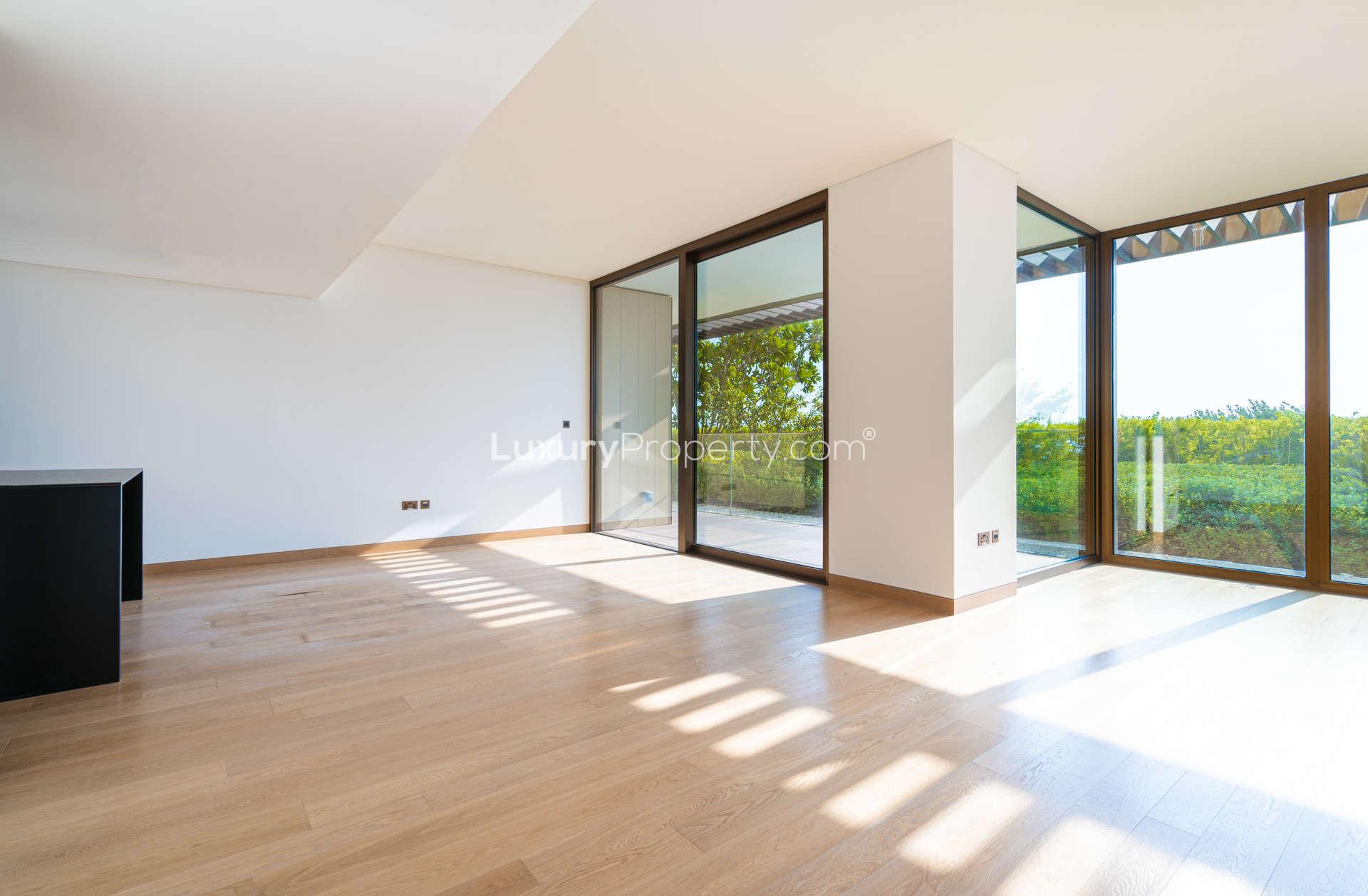 Sea view apartment exterior at Bulgari Residences, Jumeirah Bay, with modern architecture and balconies