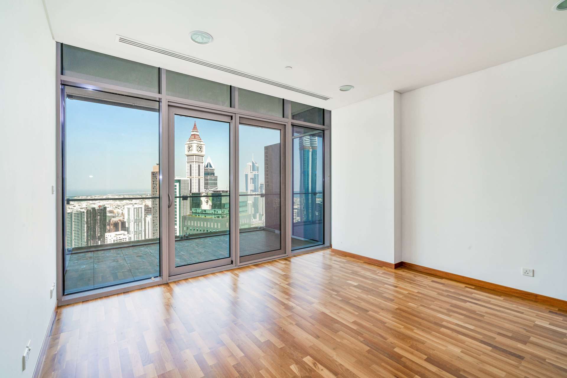 Stunning Burj Daman apartment with city view, hardwood floors, and large windows in DIFC