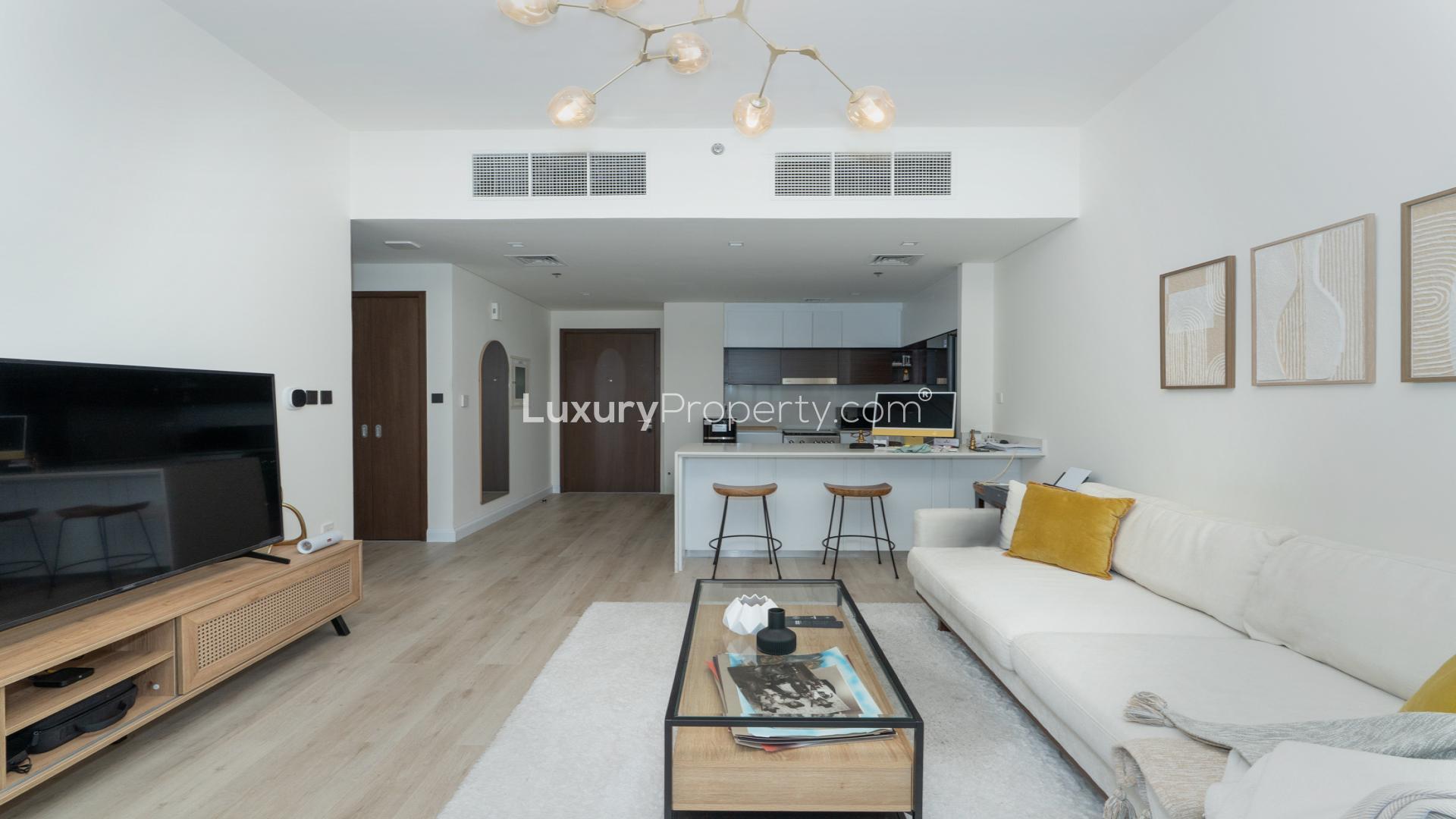 Aerial view of luxury apartment with pool and waterfront in Dubai Creek Harbour