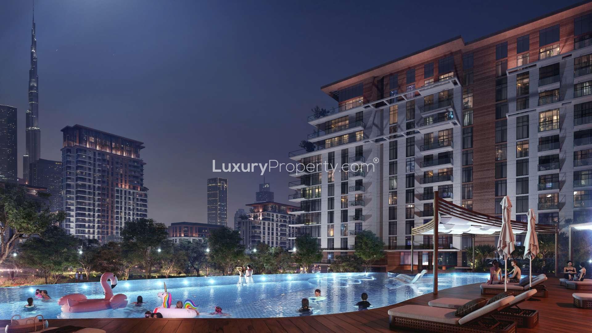 Elegant apartment building with lush park, Central Park at City Walk, vibrant community scene