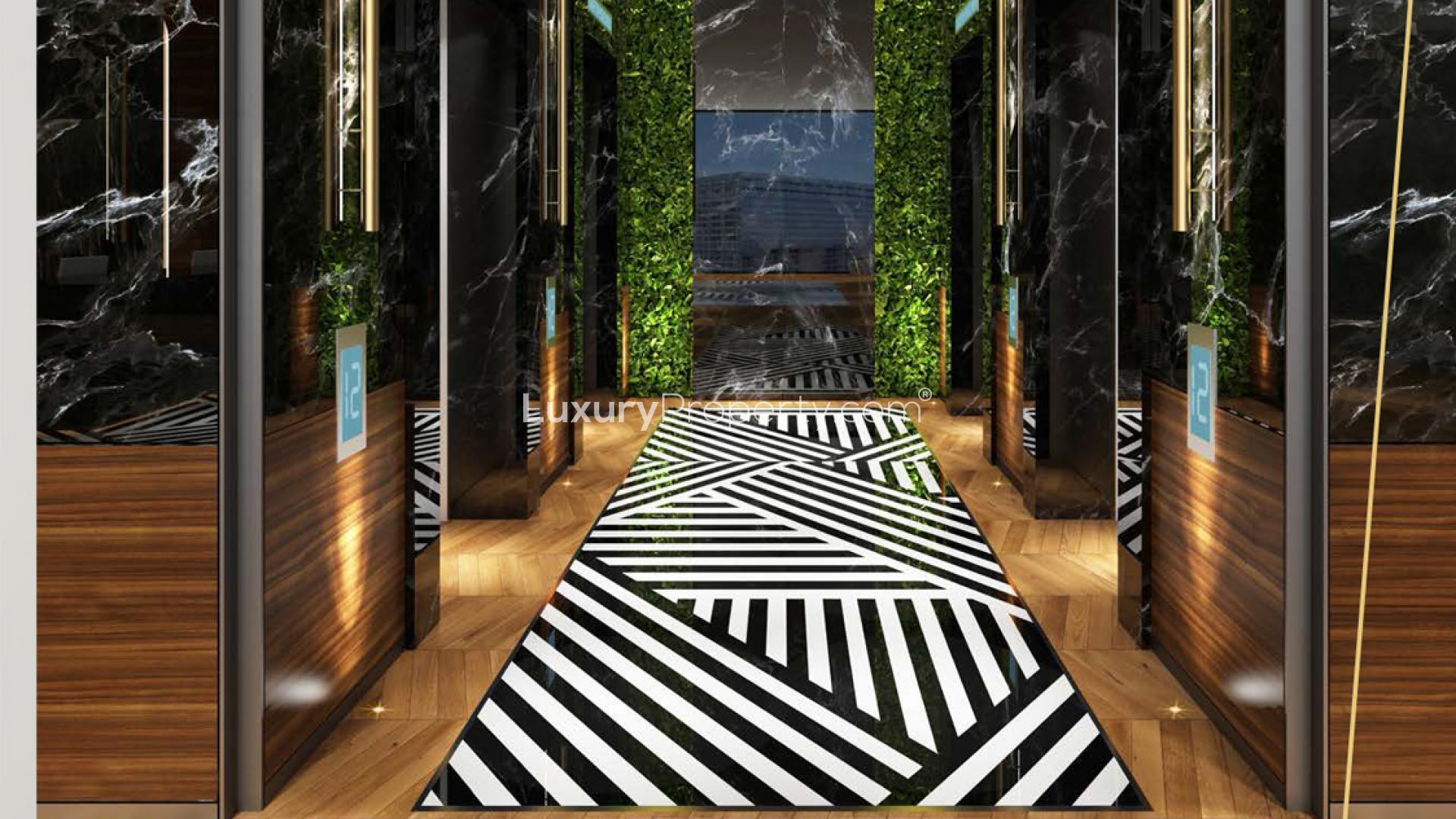 Luxurious lobby in Nobles Tower, Business Bay apartment for sale, featuring modern design elements