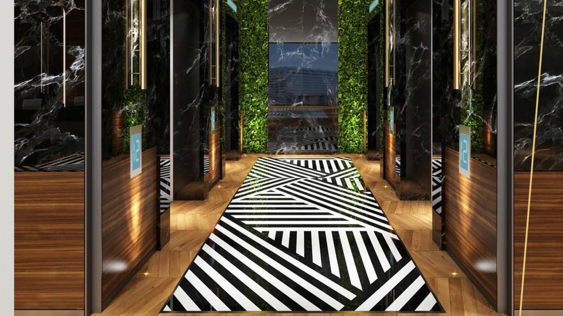 Luxurious lobby in Nobles Tower, Business Bay apartment for sale, featuring modern design elements