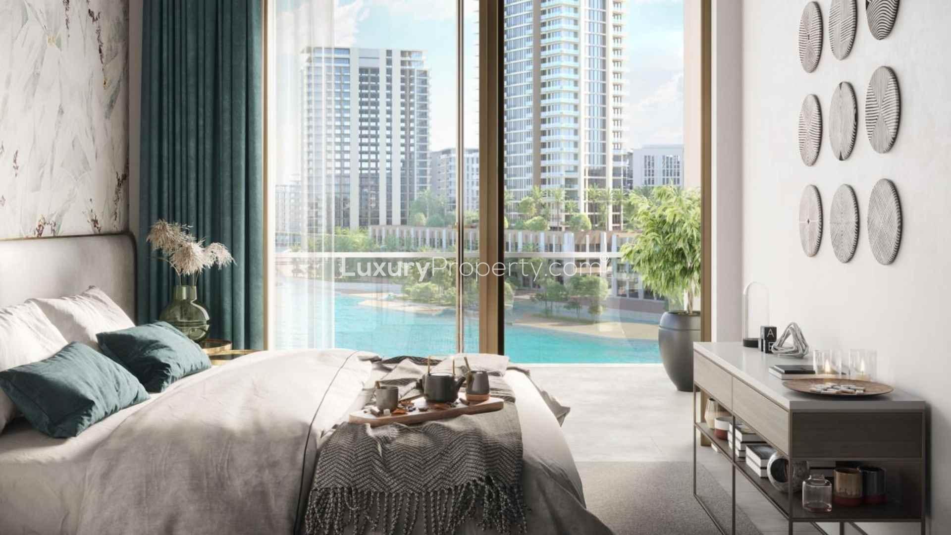 Modern open-plan kitchen and dining area in Orchid apartment, Dubai Creek Harbour