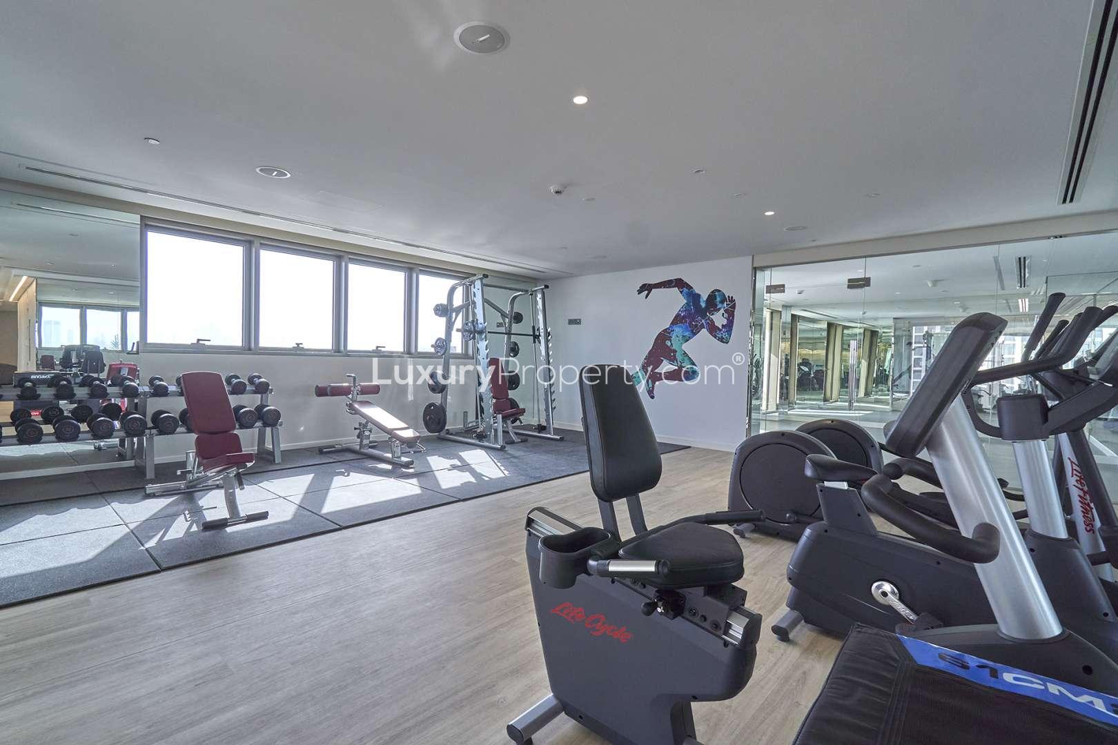 Children's playroom in Creekside 18 B apartment, Dubai Creek Harbour, with colorful mural