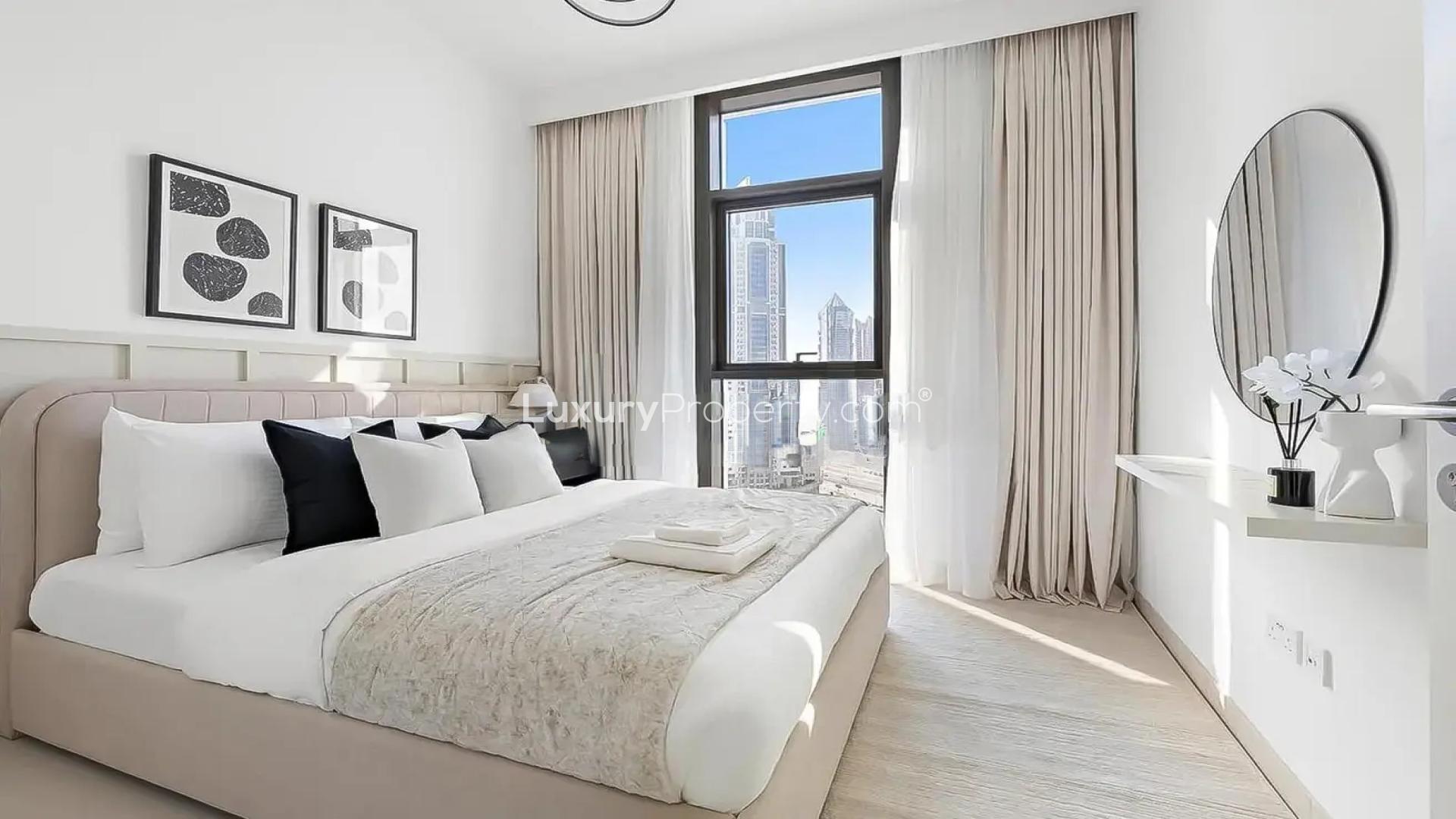 Modern kitchen and dining area in Burj Crown apartment, Downtown Dubai, with city views