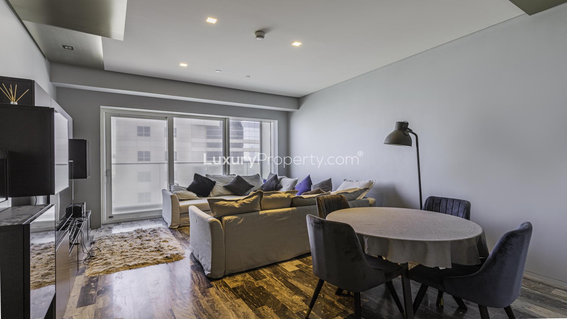 Aerial view of Dubai Marina and sea from Damac Heights apartment for sale