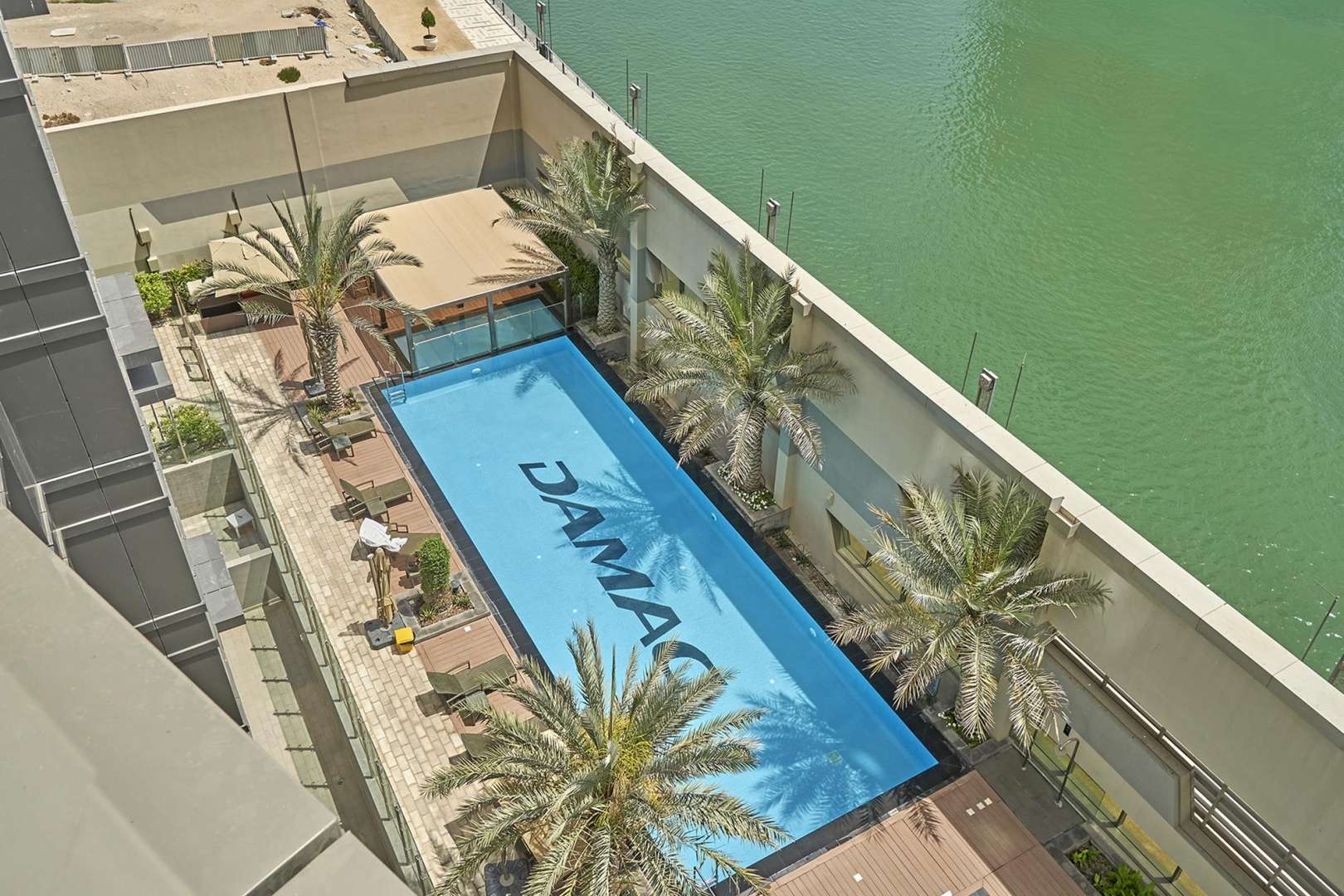 Rooftop pool at DAMAC Maison The Vogue, Business Bay apartment for sale