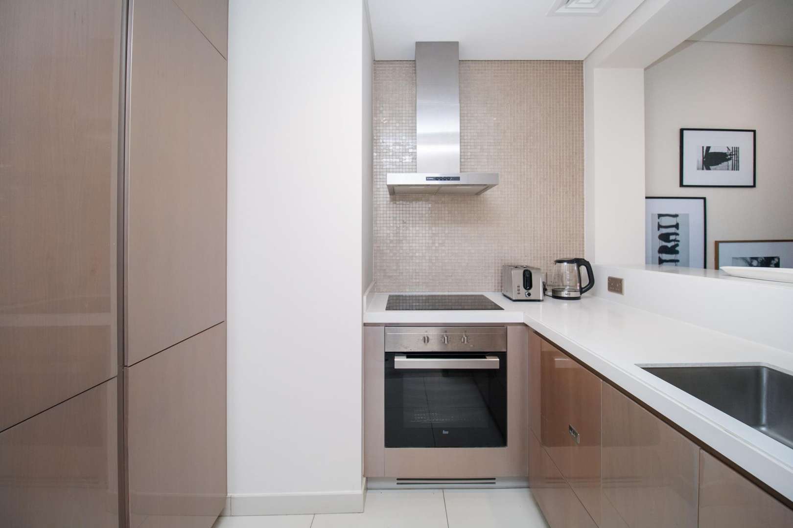 Modern kitchen in furnished 1-bedroom apartment, DAMAC Towers by Paramount, Business Bay