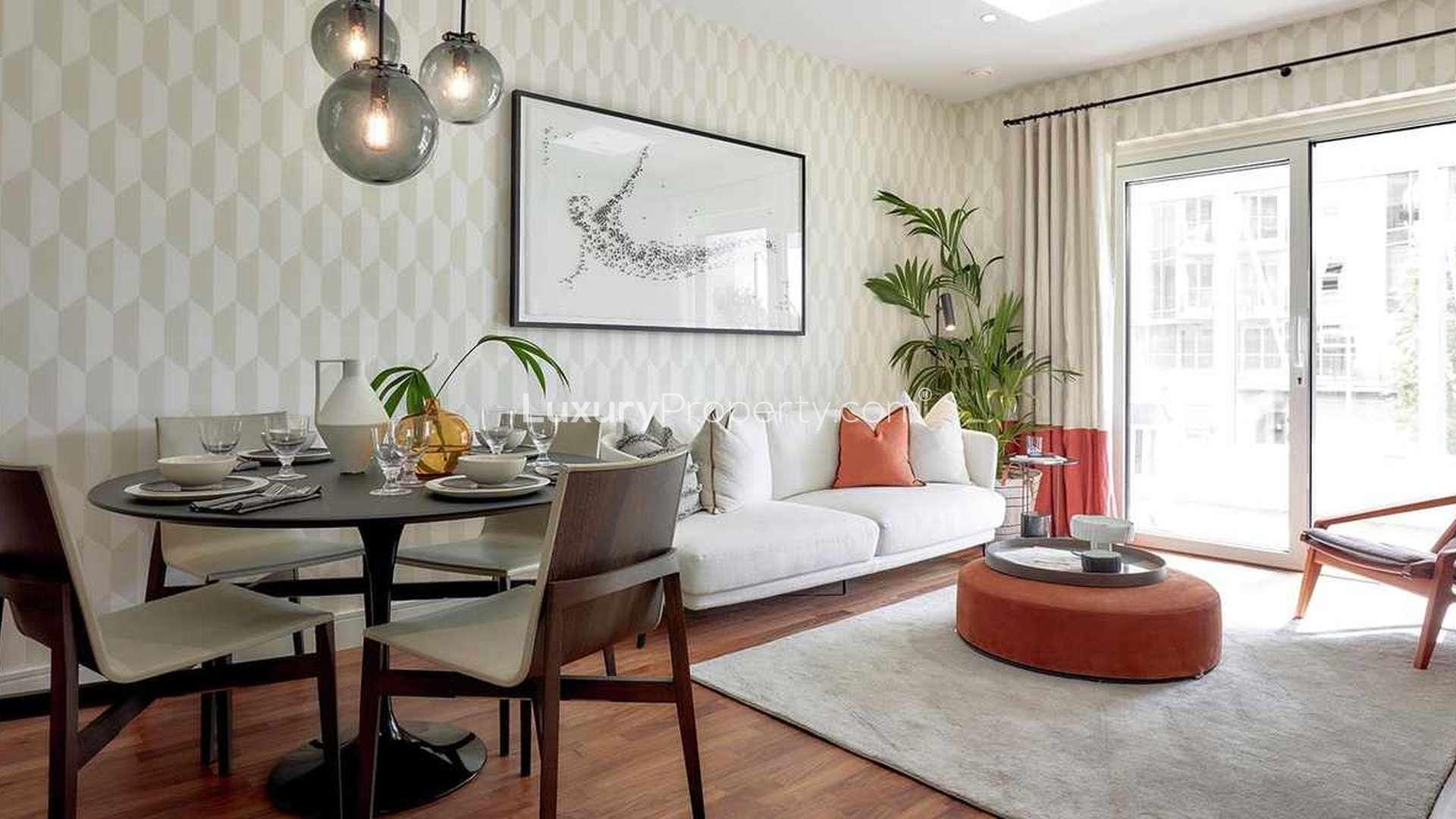 Aerial view of luxury apartments at Discovery House, Battersea Reach, along the riverside