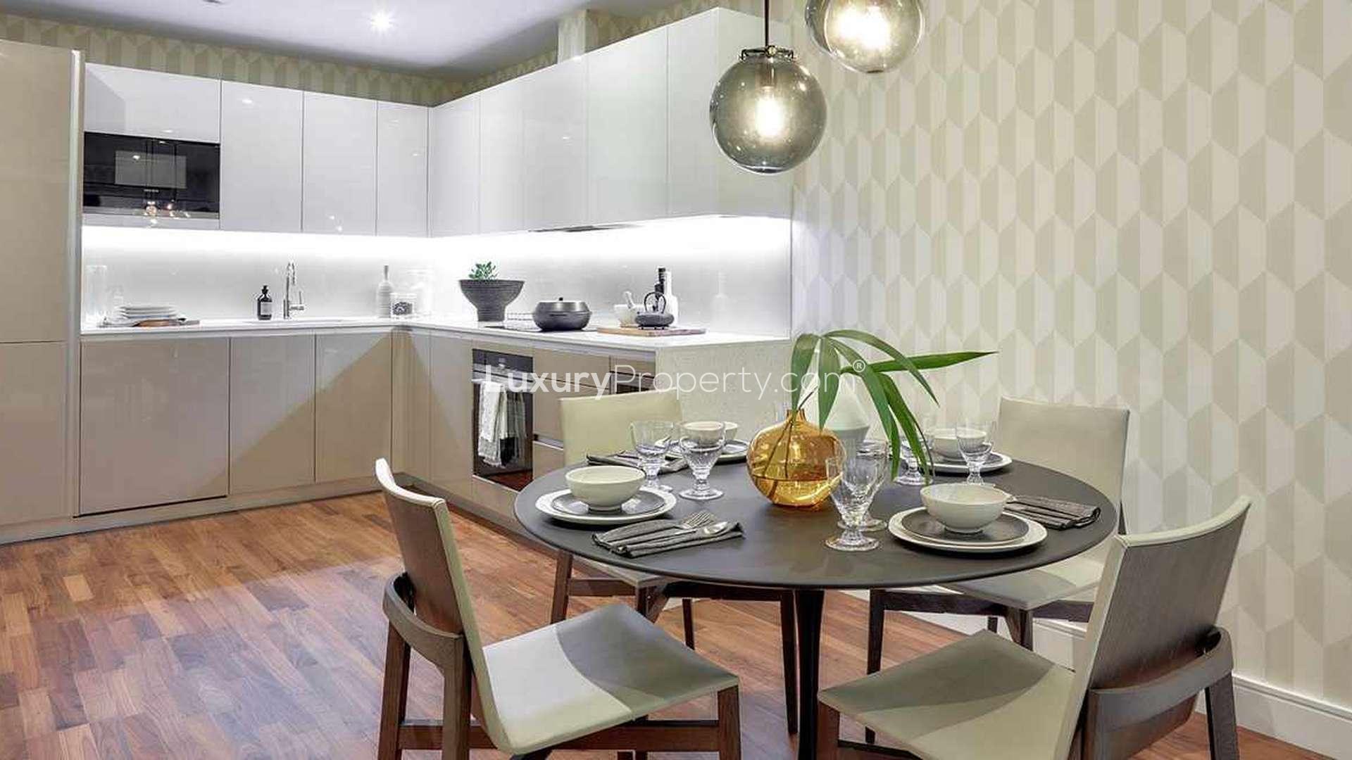 Modern living room in luxury one-bedroom apartment, Discovery House, Battersea Reach, for sale