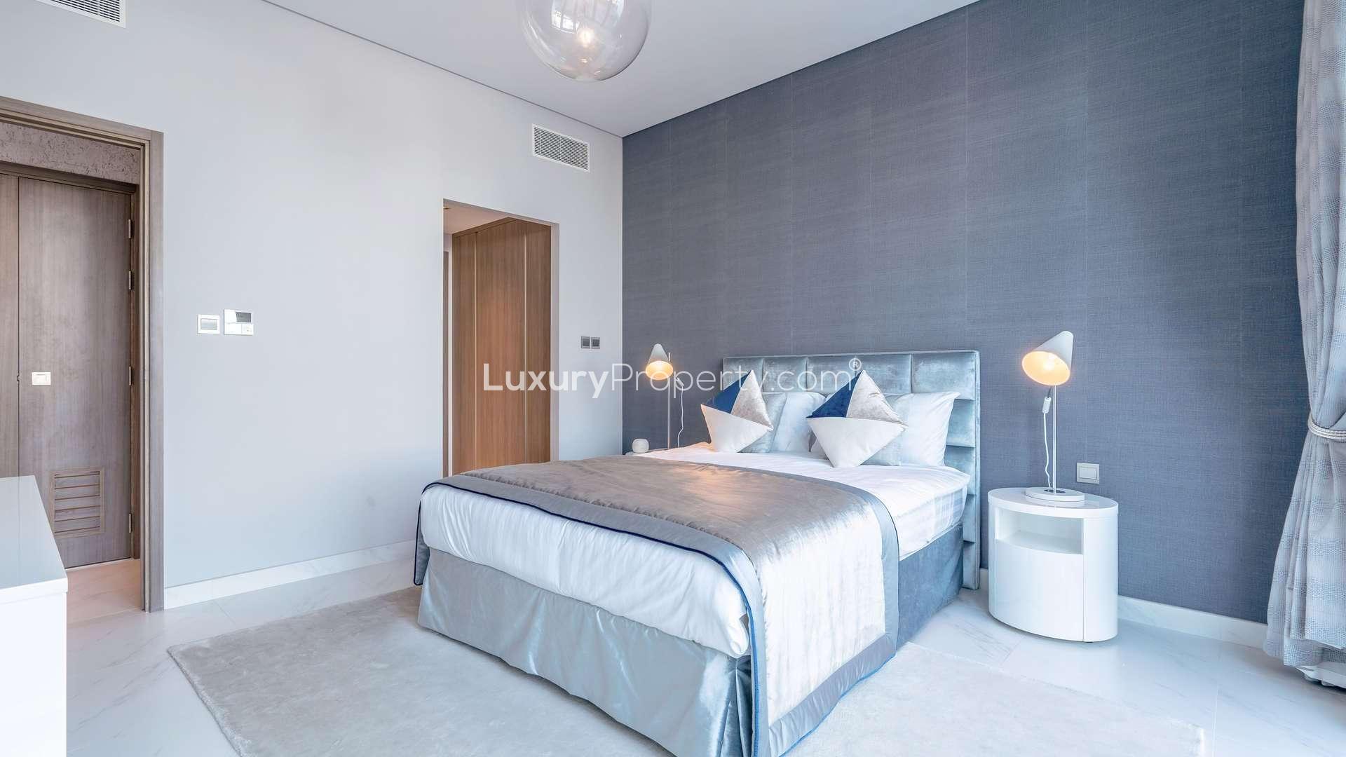 Luxurious bedroom in District One apartment, MBR City, with stylish decor and modern furnishings