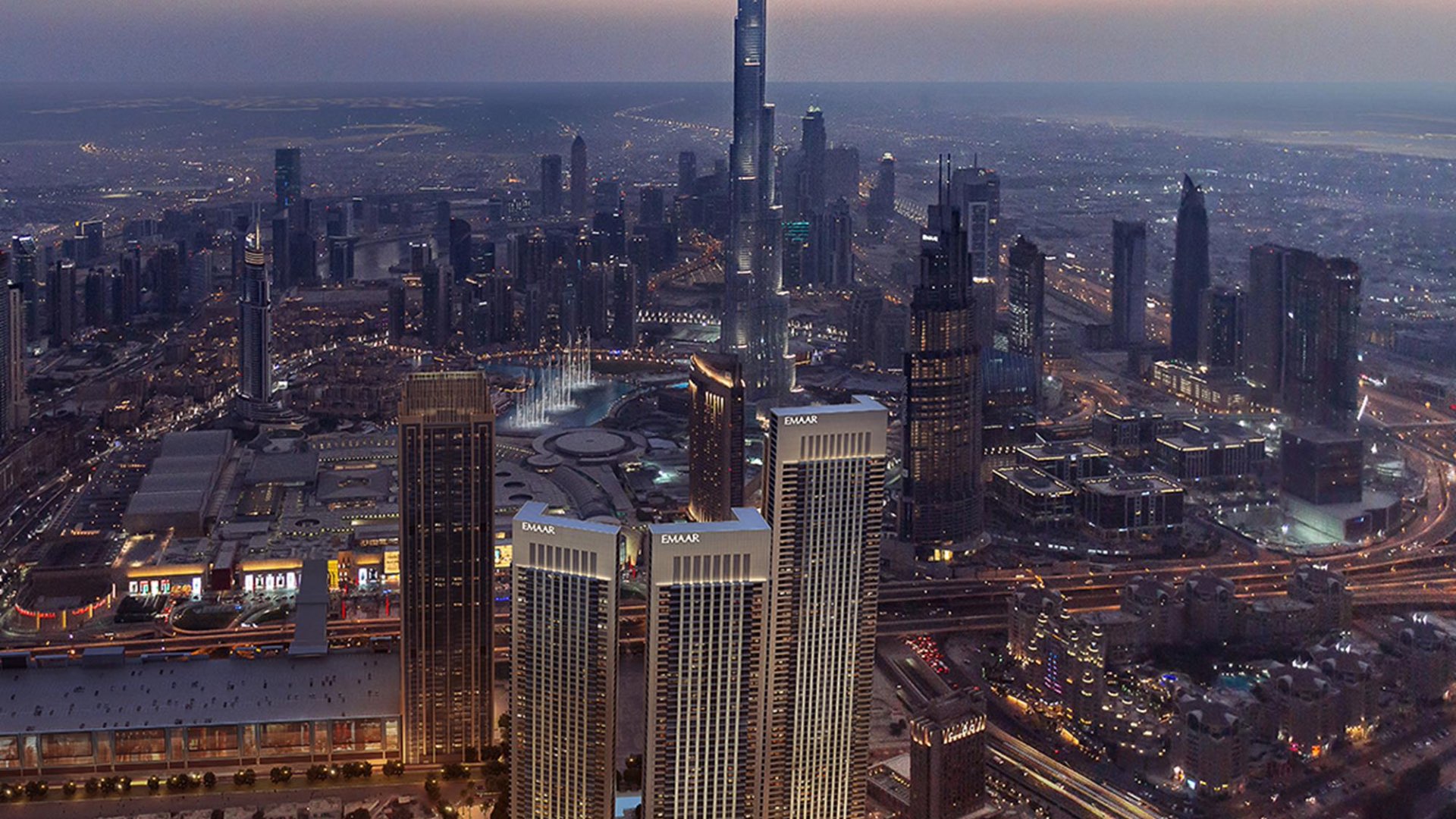 Skyline view of Downtown Dubai featuring Downtown Views II apartment buildings at dusk