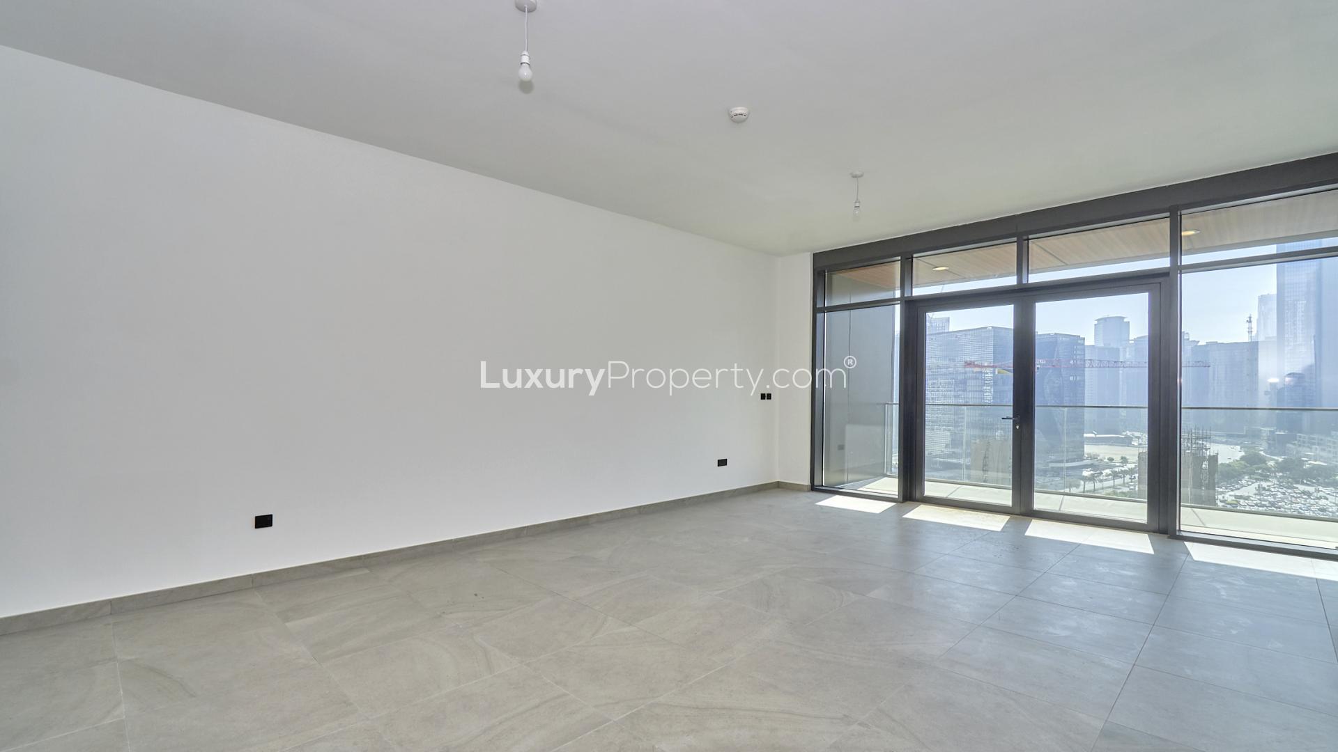 Aerial view of swimming pool and sun loungers at DT1 apartment, Downtown Dubai