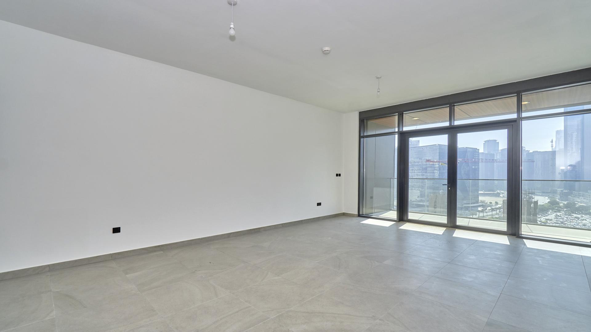 Aerial view of swimming pool and sun loungers at DT1 apartment, Downtown Dubai