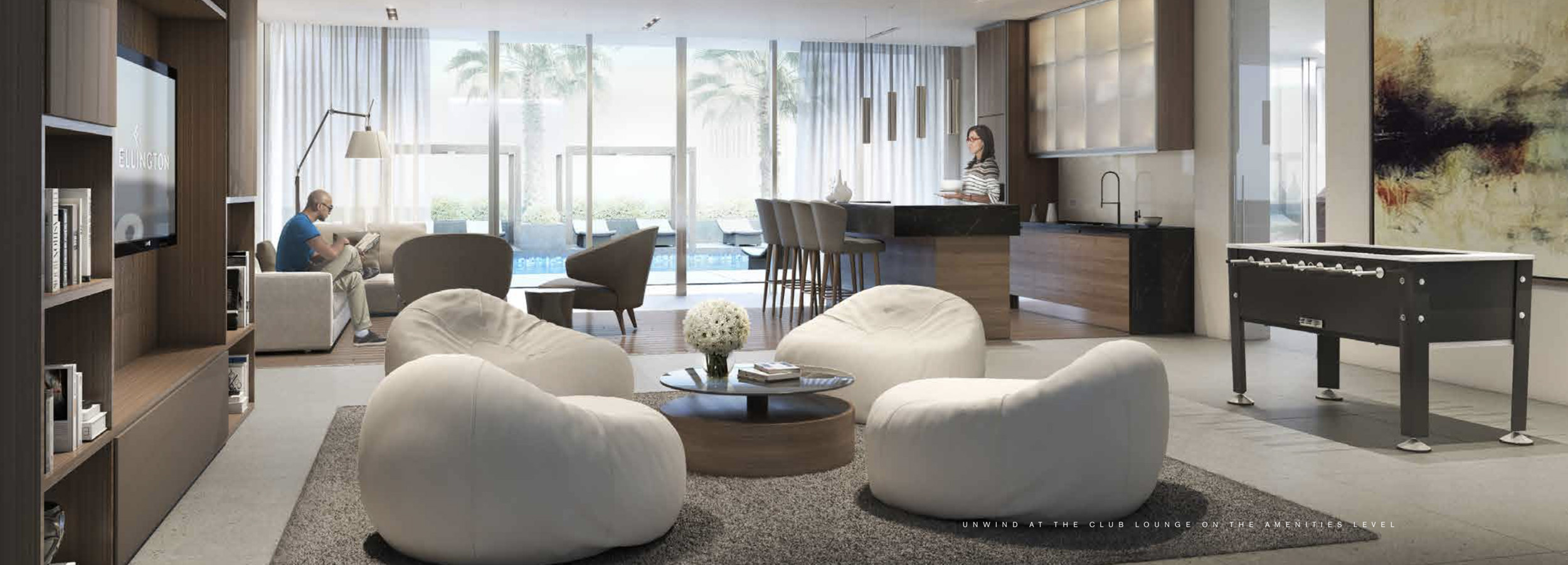 Modern living area in DT1 Downtown Dubai apartment with foosball and seating