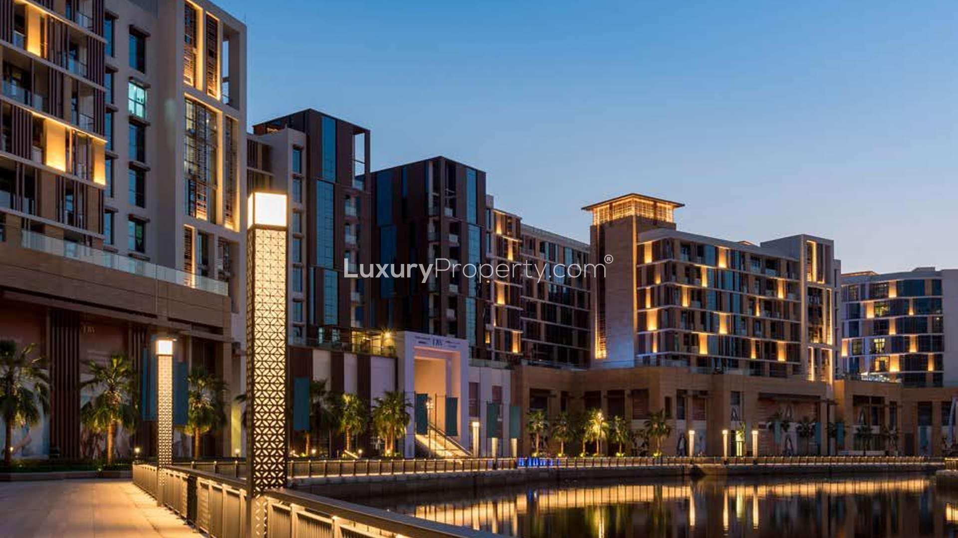 Luxurious one-bedroom apartment interior at Dubai Wharf, Culture Village, featuring elegant decor