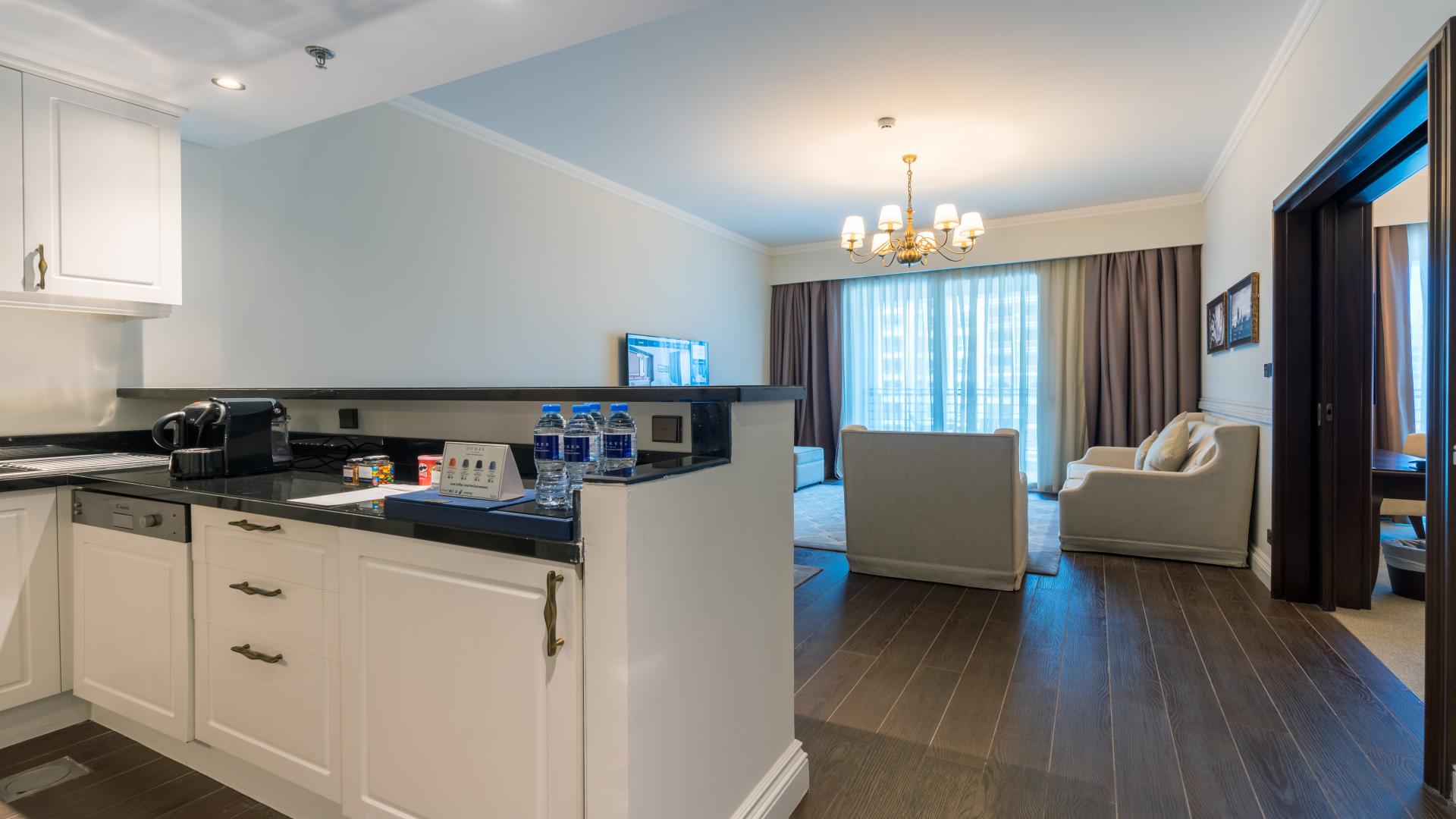 Luxurious furnished kitchen and living area in 1-bedroom apartment, Oceana Dukes, Palm Jumeirah