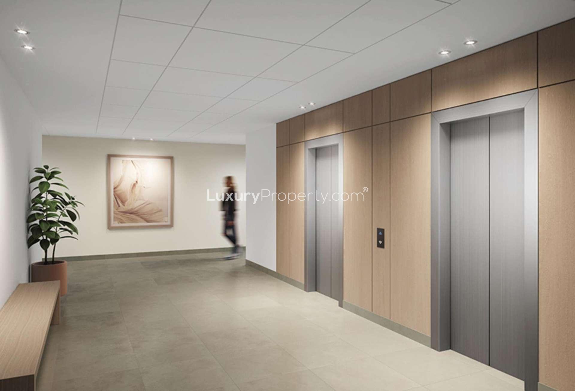 Contemporary living area in one-bedroom apartment at Eaton Place, Jumeirah Village Circle