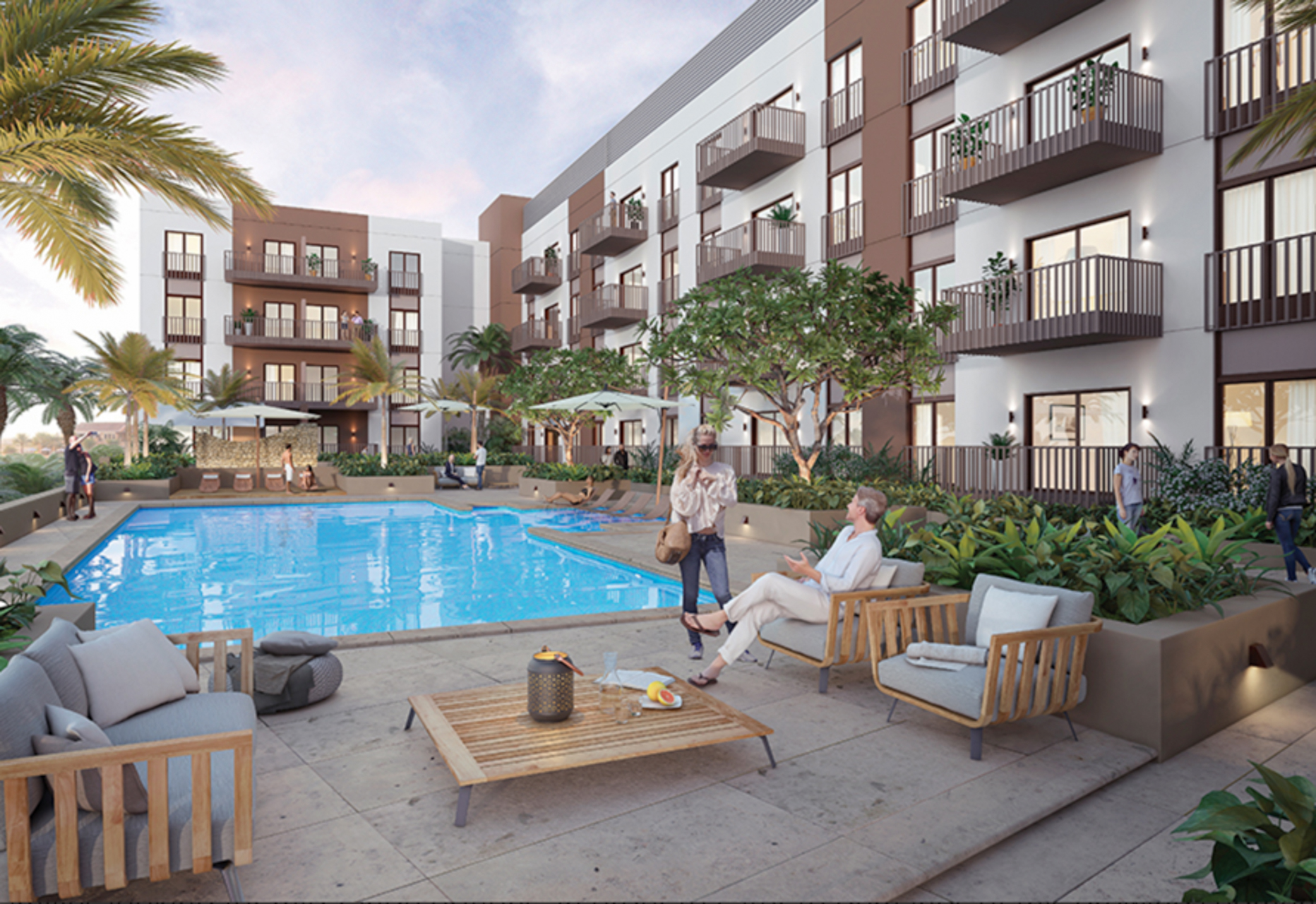 Modern gym at Eaton Place, Jumeirah Village Circle apartment, featuring exercise equipment and palm views