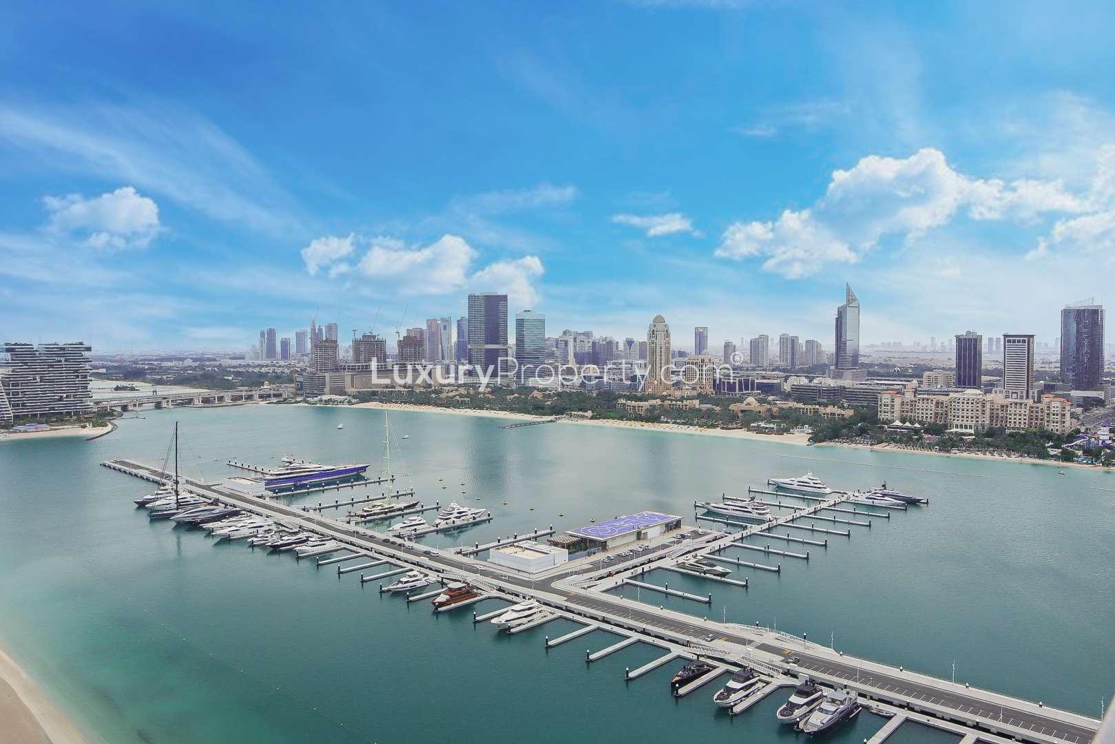 Aerial view of Dubai Harbour marina and beachfront at Emaar Beachfront, Sunrise Tower apartment