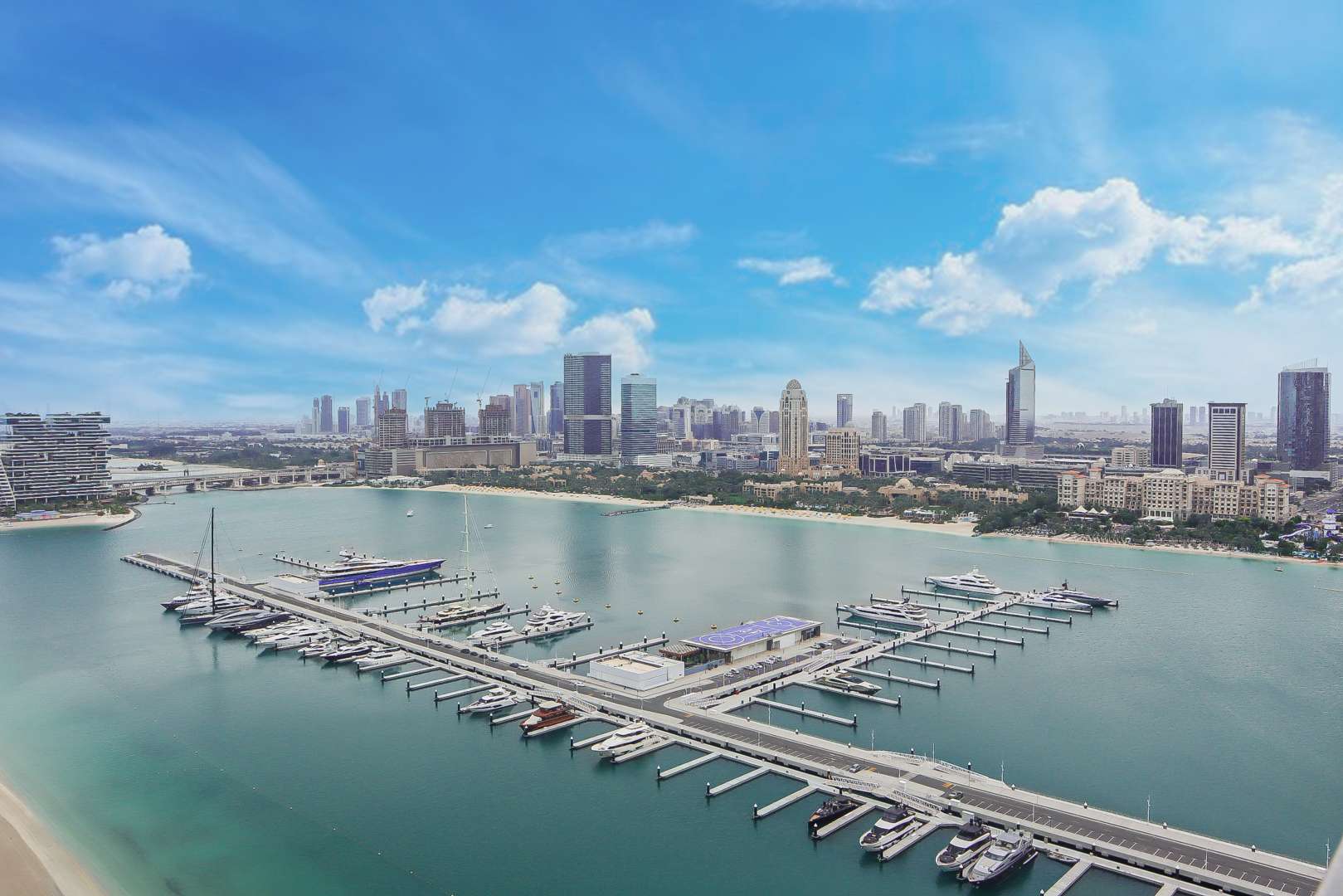 Aerial view of Dubai Harbour marina and beachfront at Emaar Beachfront, Sunrise Tower apartment