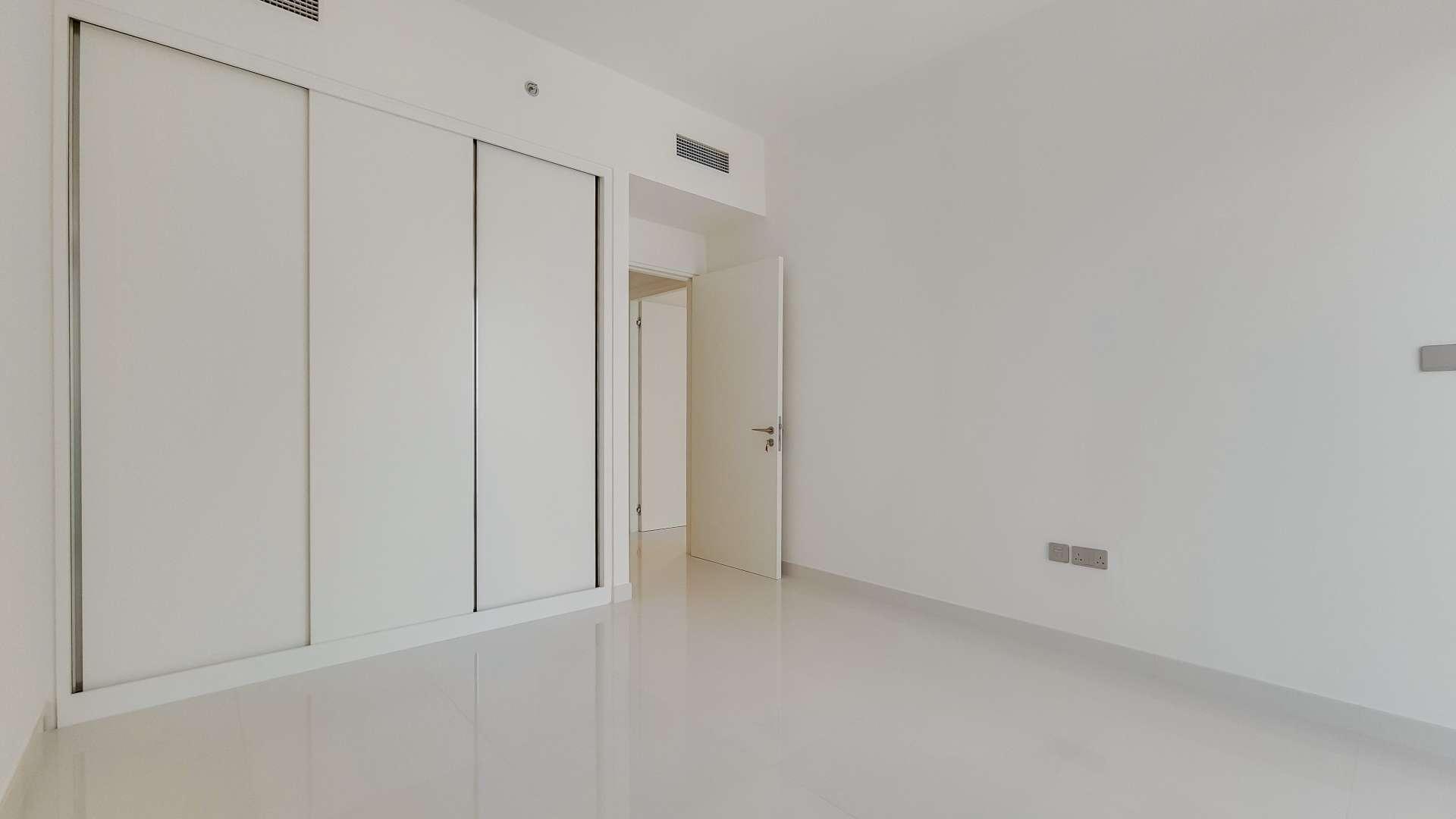 Modern kitchen in one-bedroom beachfront apartment, Emaar Beachfront, Dubai Harbour, with sea view