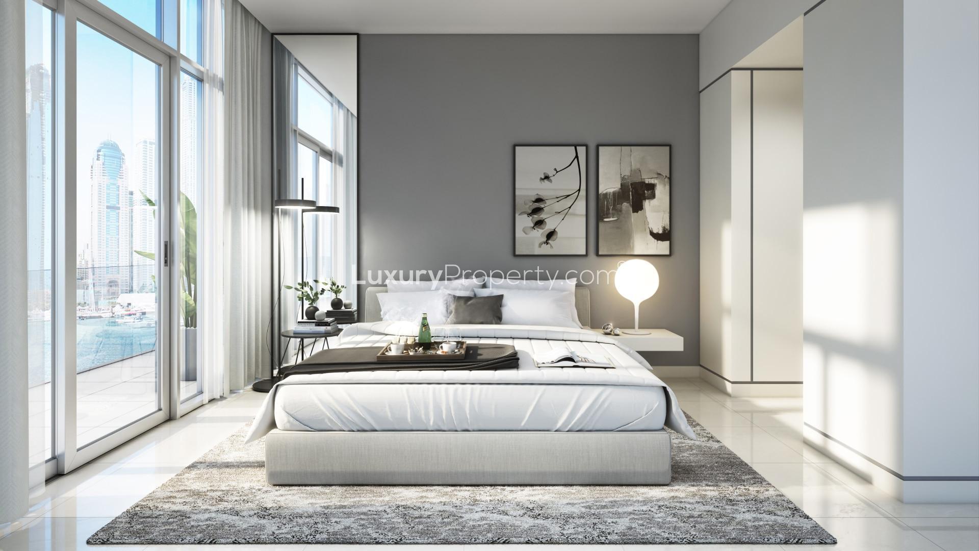 Modern bedroom in Emaar Beachfront apartment with city view, Dubai Harbour