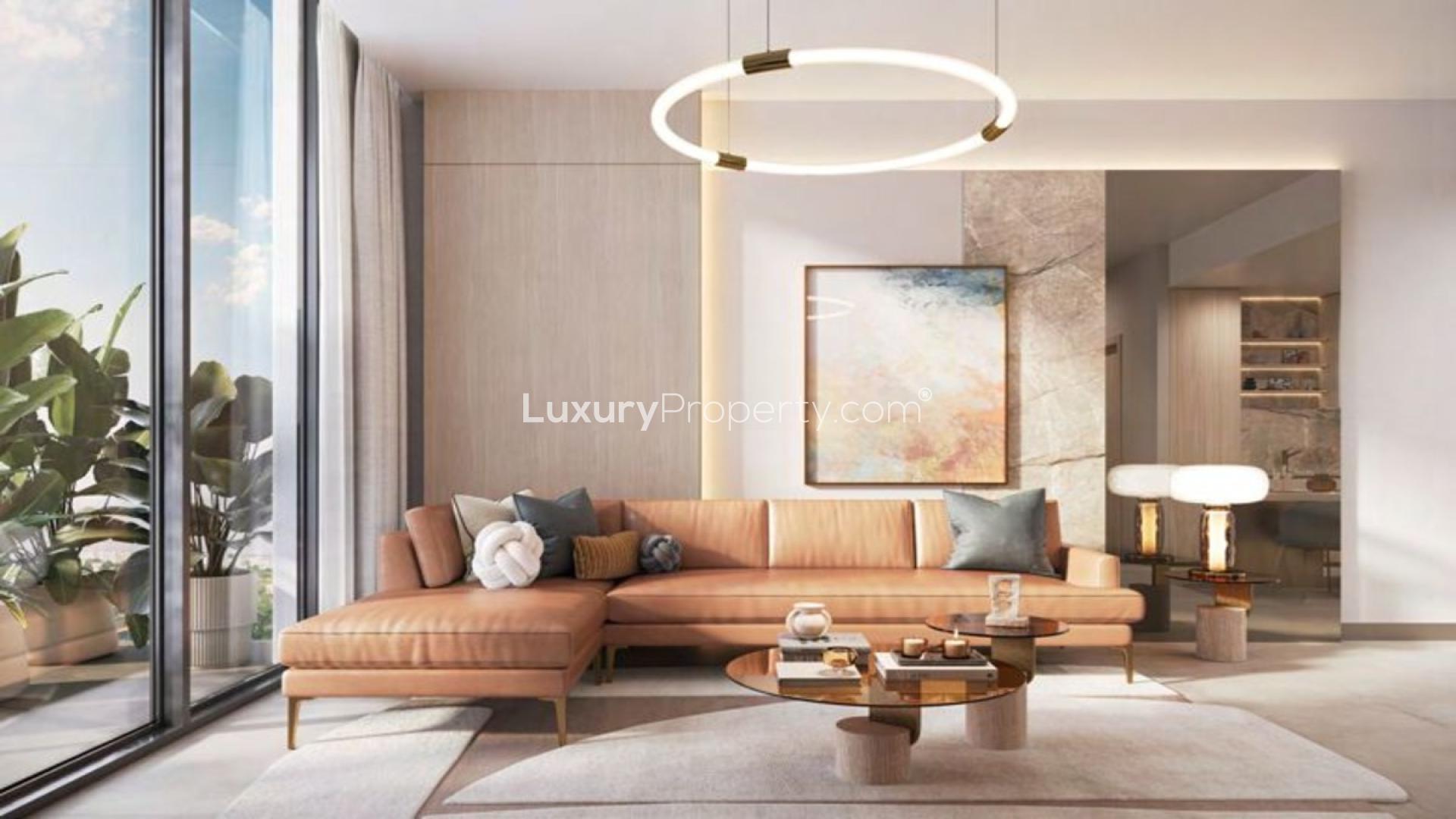 Modern apartment building with lush balconies in Jumeirah Village Circle, District 14
