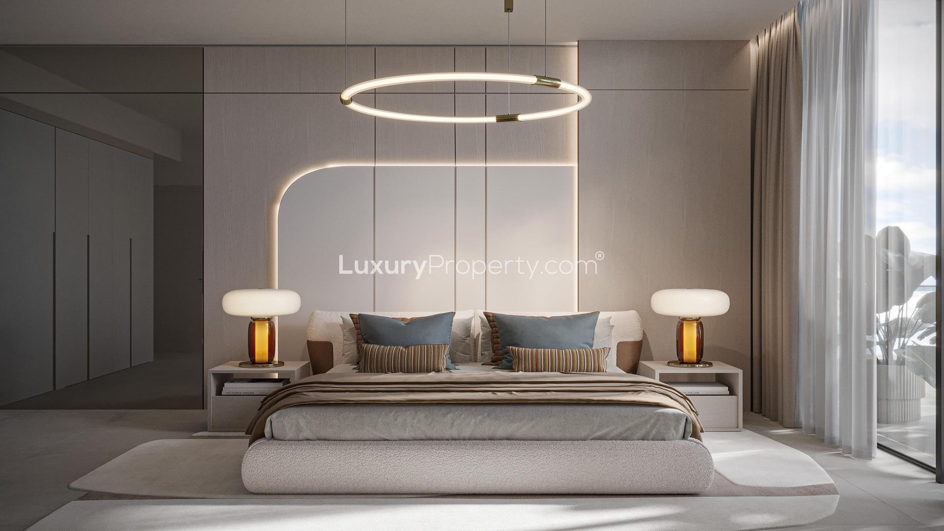 Stylish living room in Jumeirah Village Circle apartment with modern decor and natural light