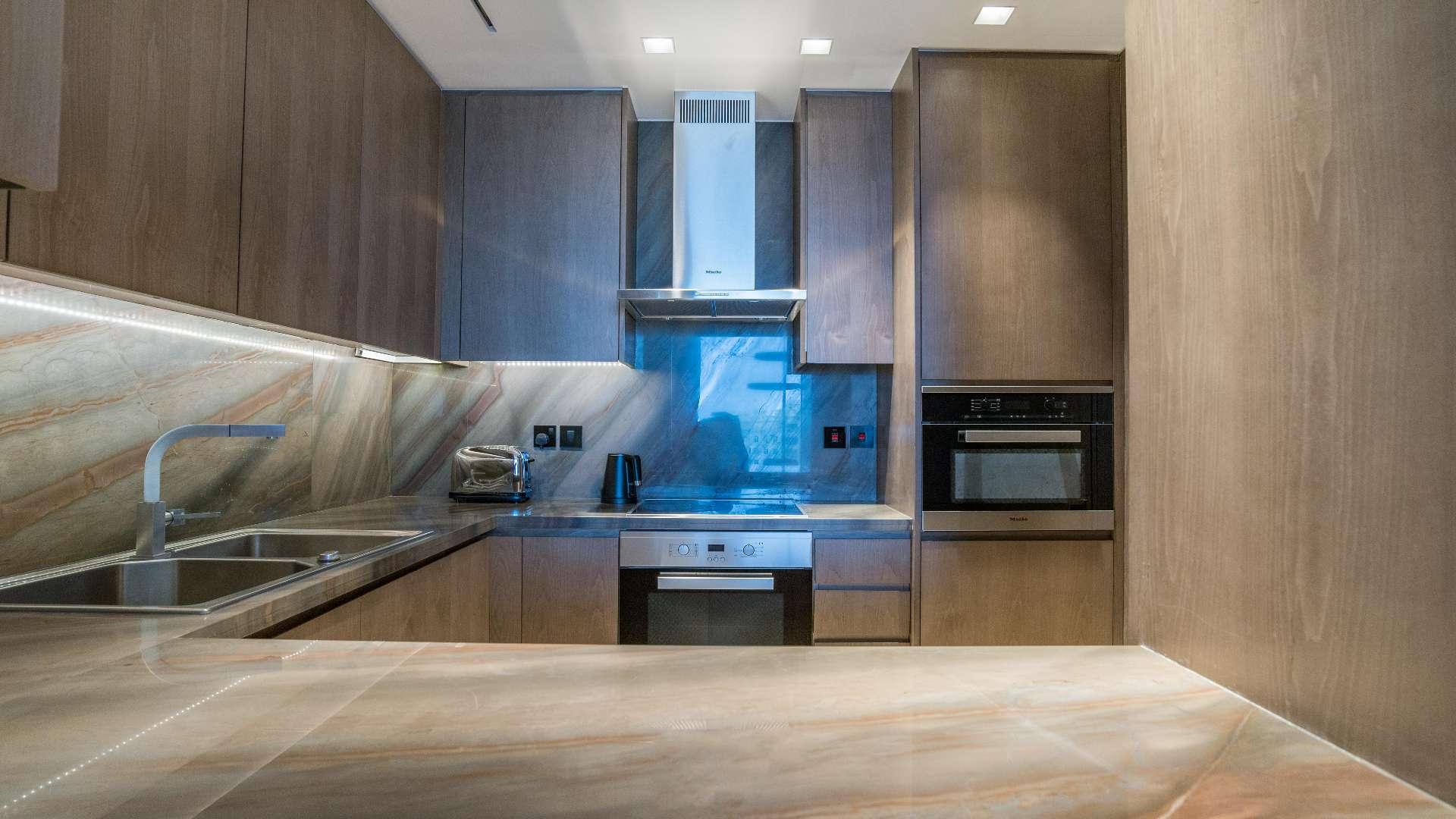 Modern dining area in waterfront 1-bedroom apartment, Five Palm Jumeirah, city views
