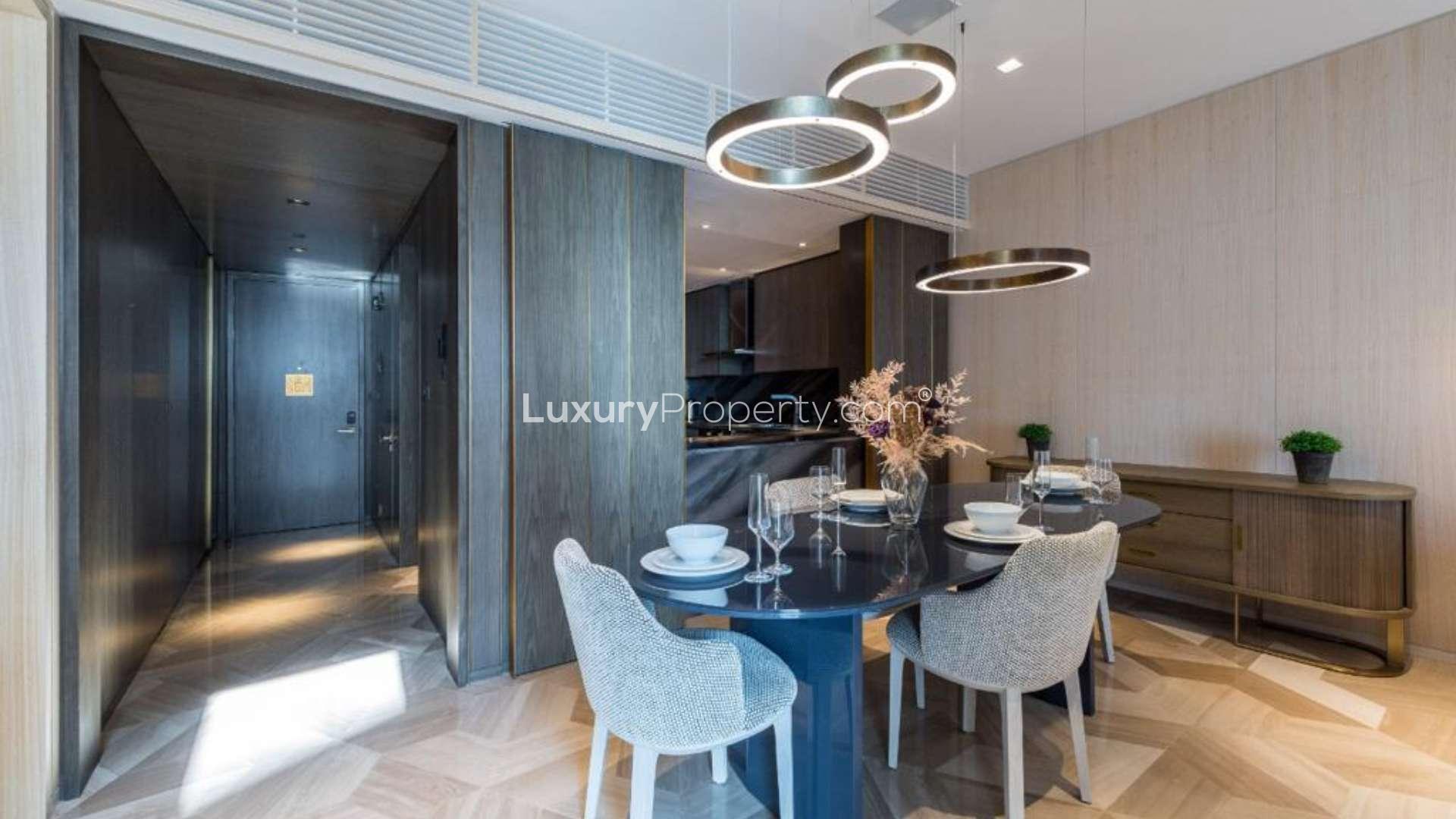 Luxurious dining and living area in Five Palm Jumeirah apartment for sale