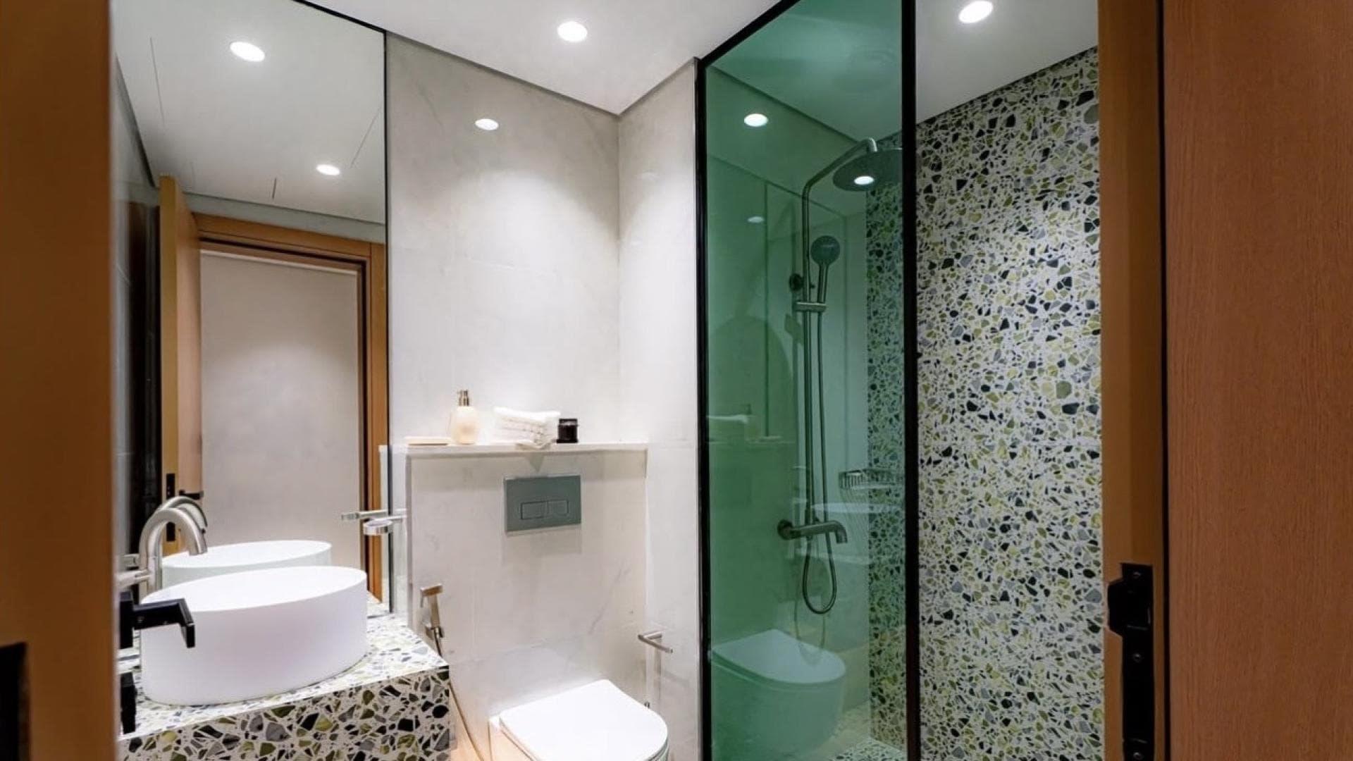 High-floor living room in Neva Residences, Jumeirah Village Circle apartment for sale