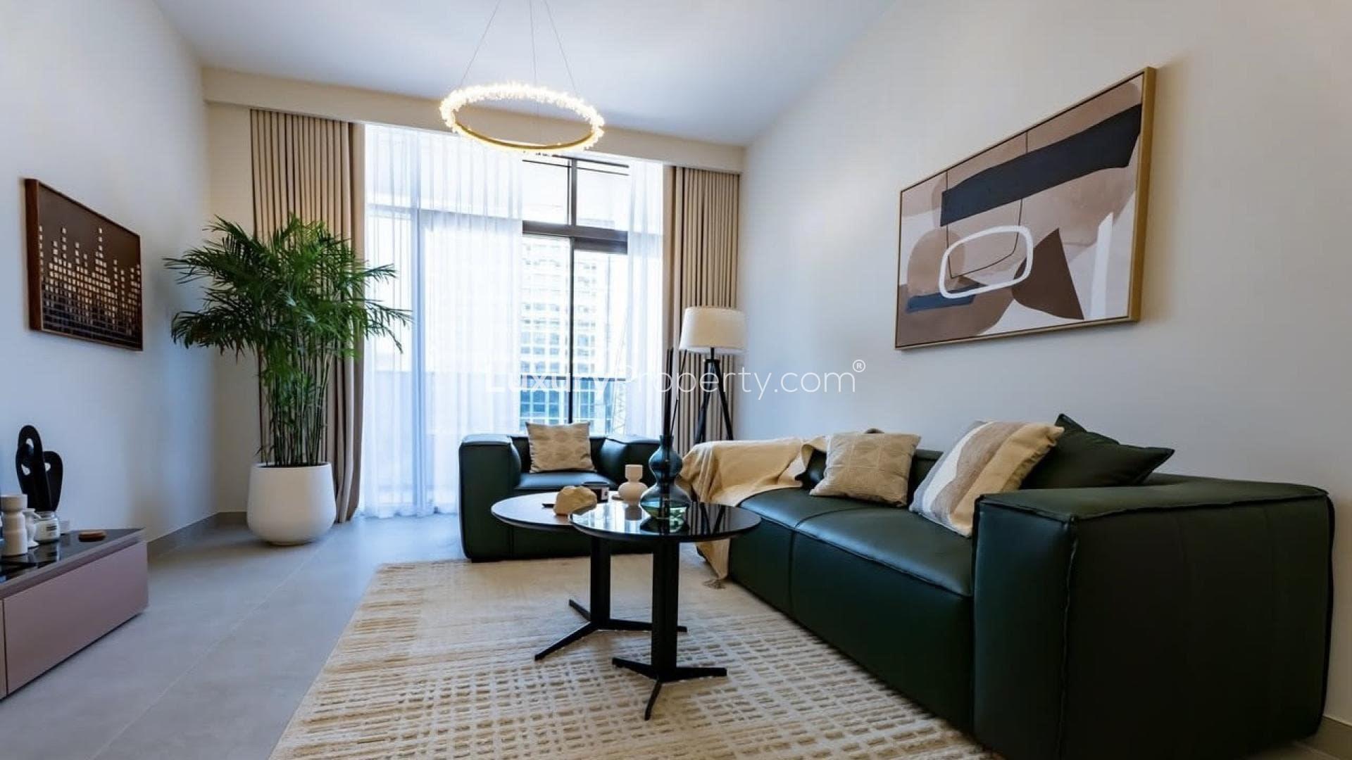 High-floor living room in Neva Residences, Jumeirah Village Circle apartment for sale