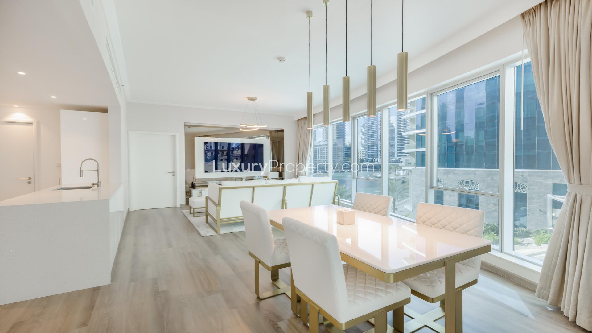 Modern living room in fully furnished Dubai Marina apartment, featuring elegant decor and ample space