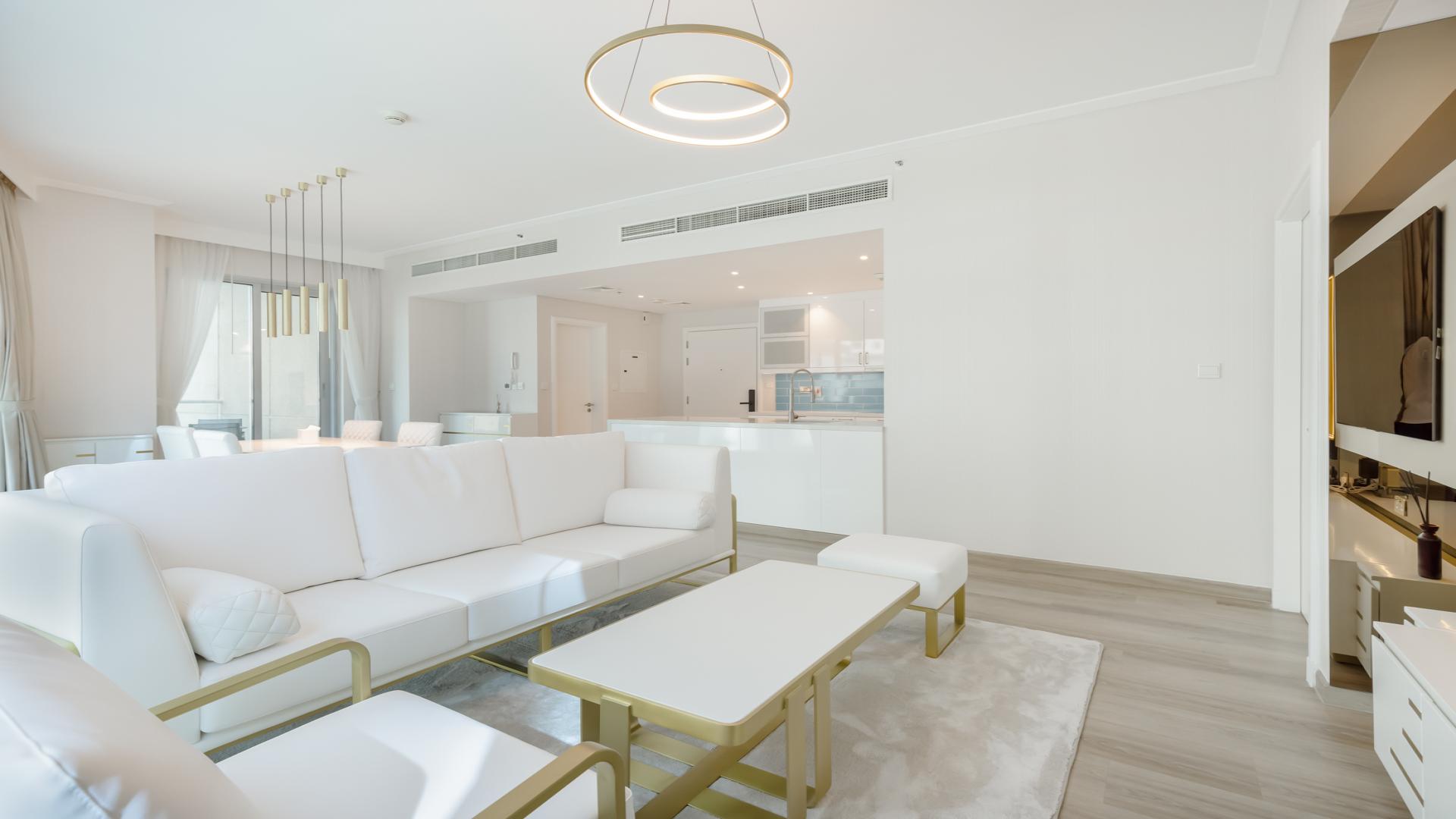 Upgraded 1-bedroom apartment living area in Beauport Tower, Dubai Marina, modern furnishings