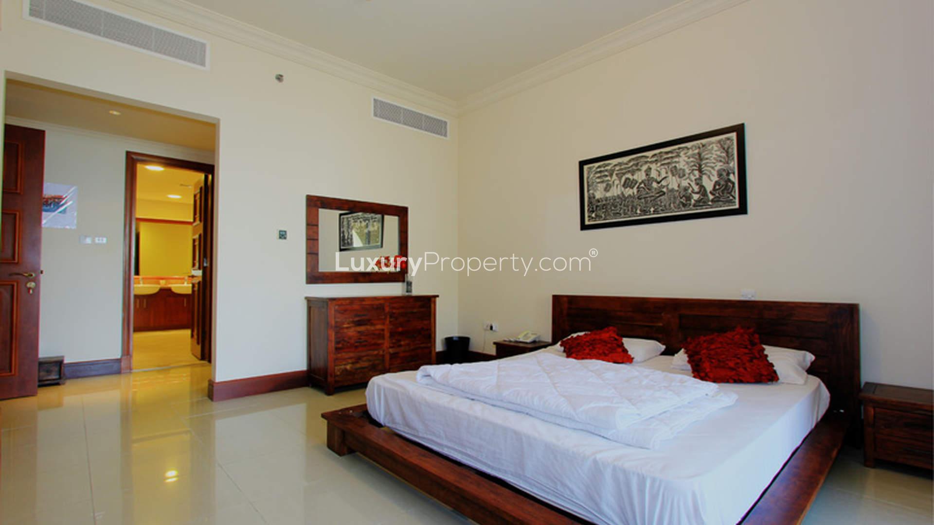 High-floor apartment view, Golden Mile 9, Palm Jumeirah, featuring residential towers and greenery