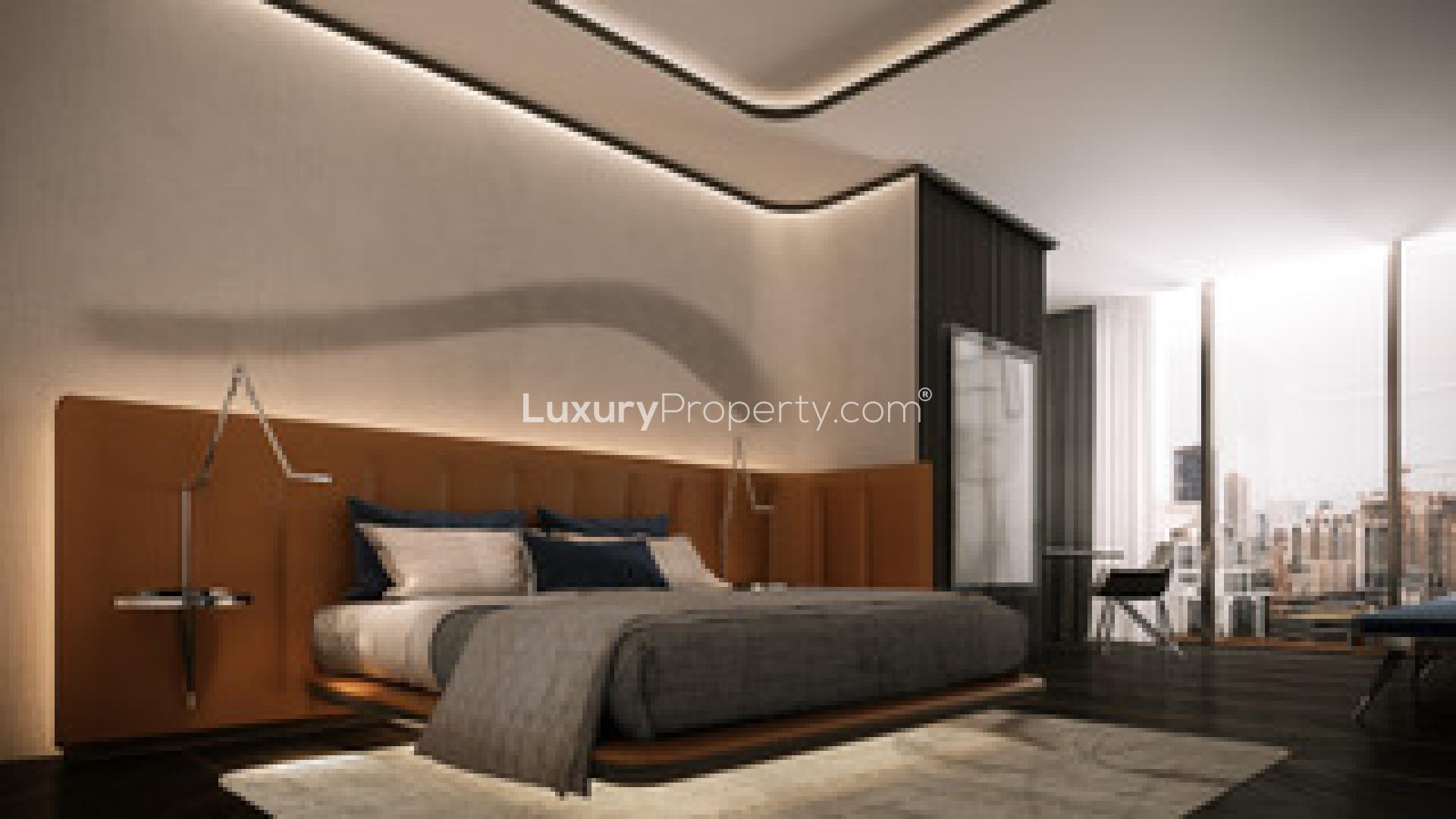 Ultra-luxury DaVinci Tower apartment exterior in Business Bay, Dubai, waterfront view