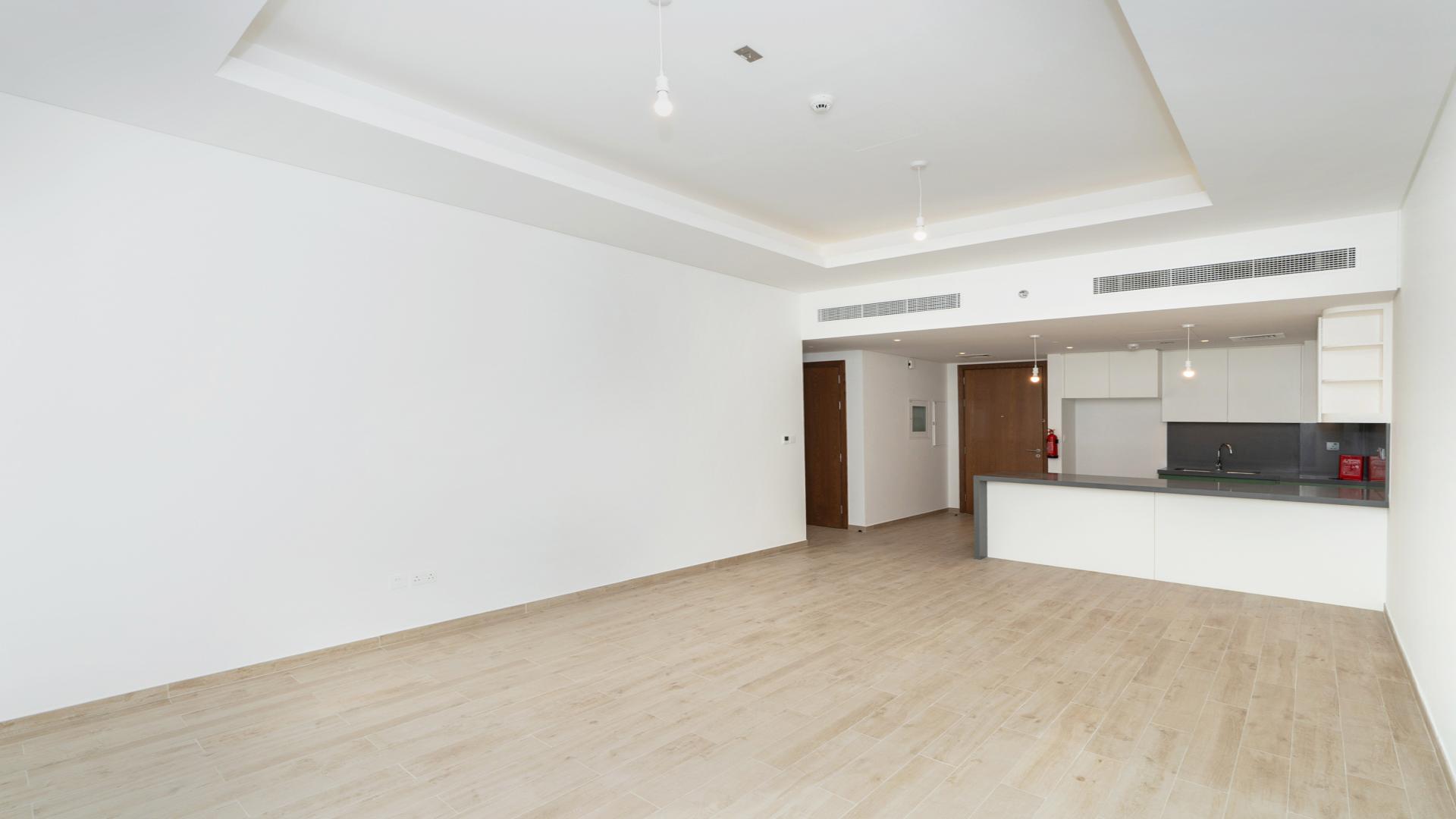 Modern open-plan kitchen and living area in 1-bedroom apartment, Central Park, City Walk