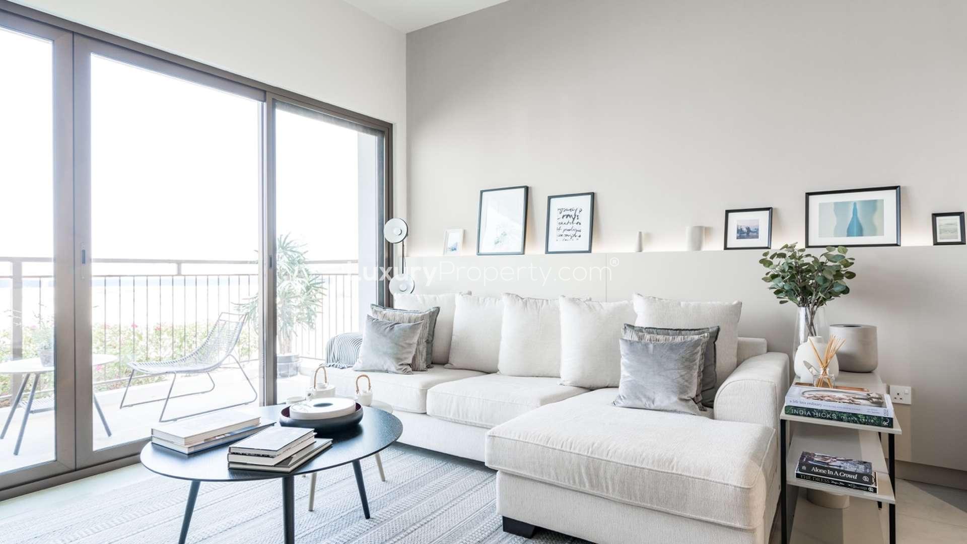 Stunning Golf View apartment living room with modern decor at Emaar South, Dubai