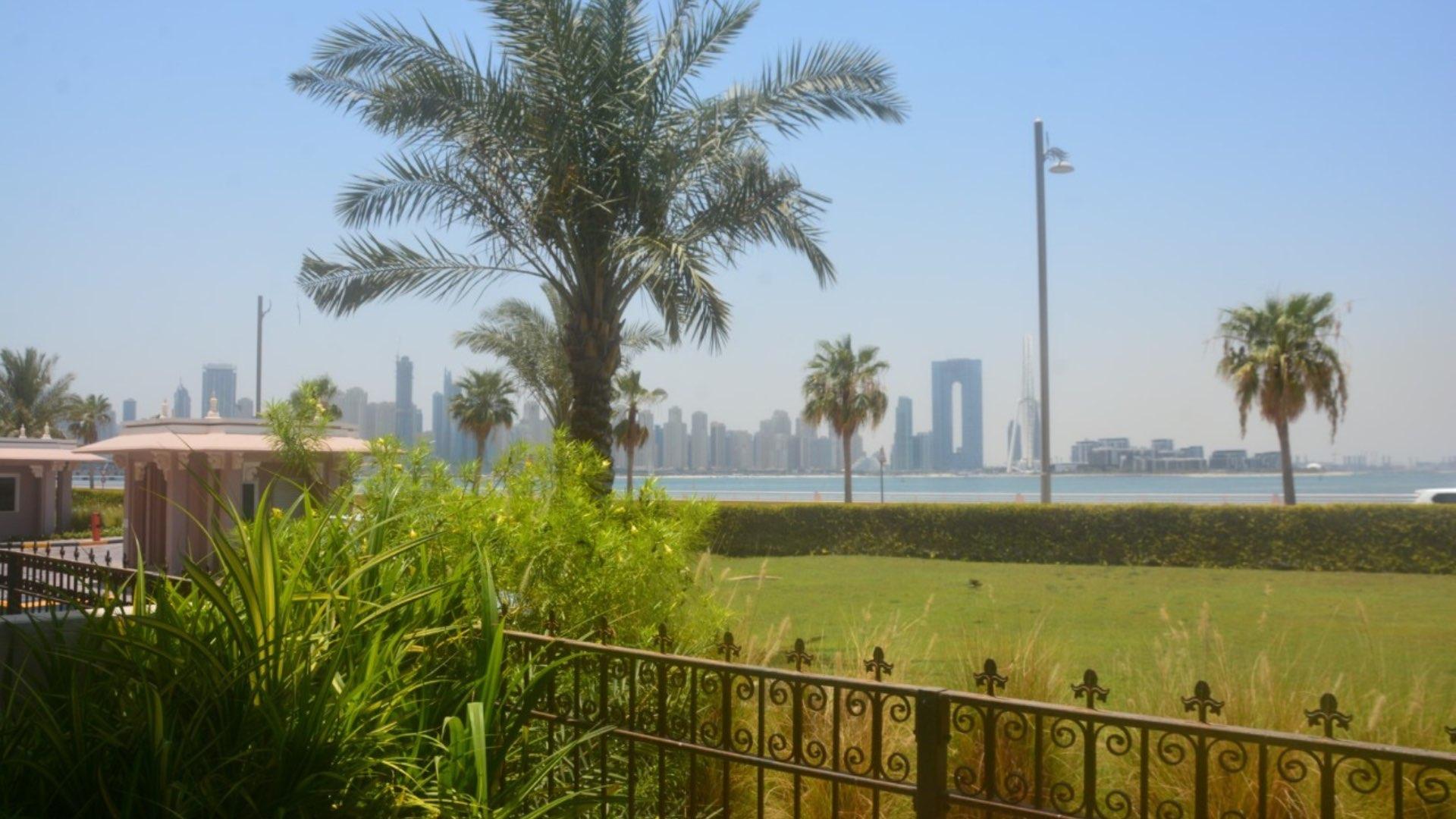 Luxury apartment living room with elegant decor and garden view in Palm Jumeirah