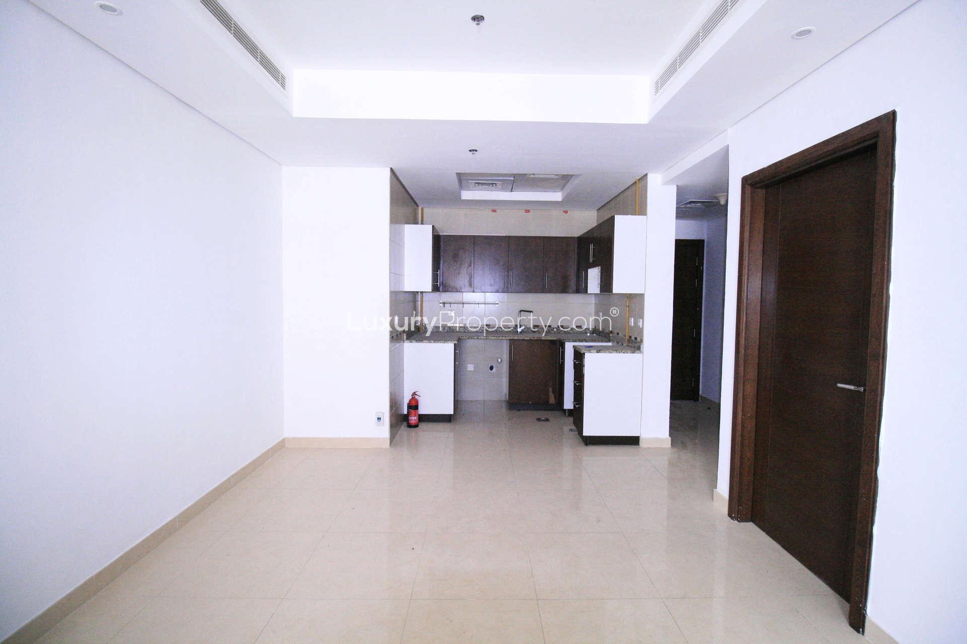 Empty kitchen and living area in 1-bedroom apartment, Living Legends Hercules community