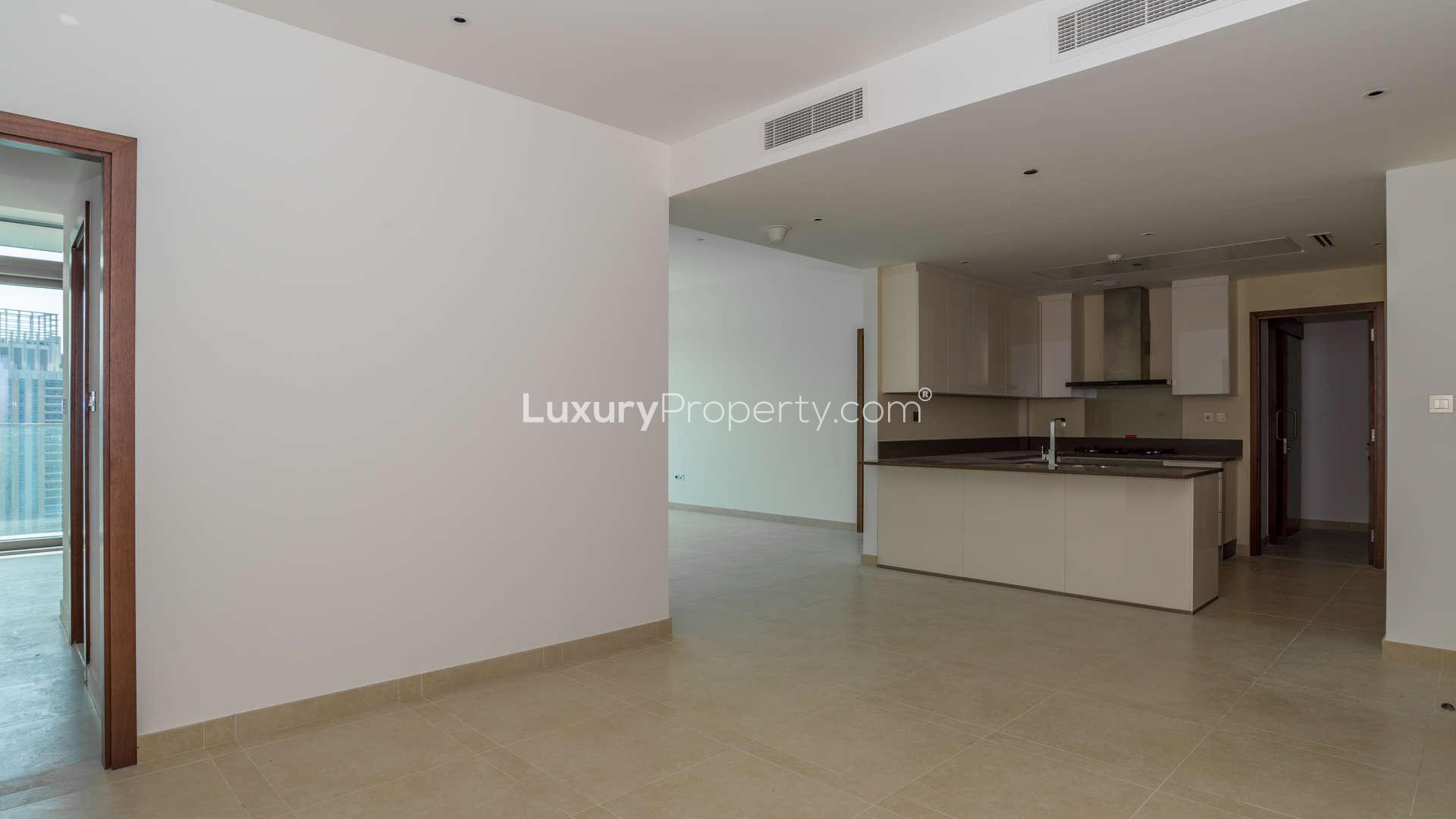 Empty bedroom with built-in wardrobe at Jumeirah Living Marina Gate, Dubai Marina apartment