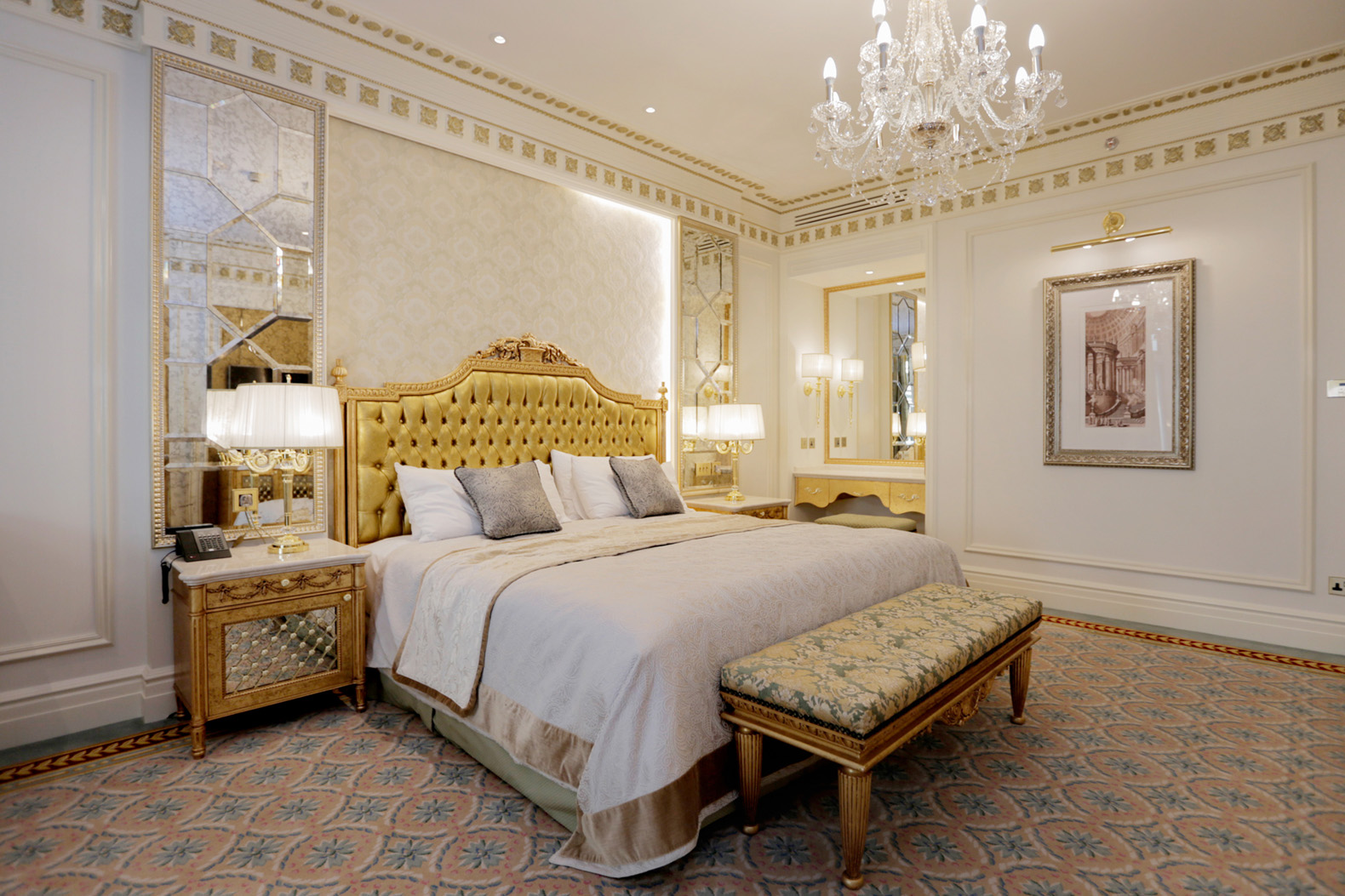 Luxurious bedroom in Palm Jumeirah apartment with elegant decor and chandelier lighting