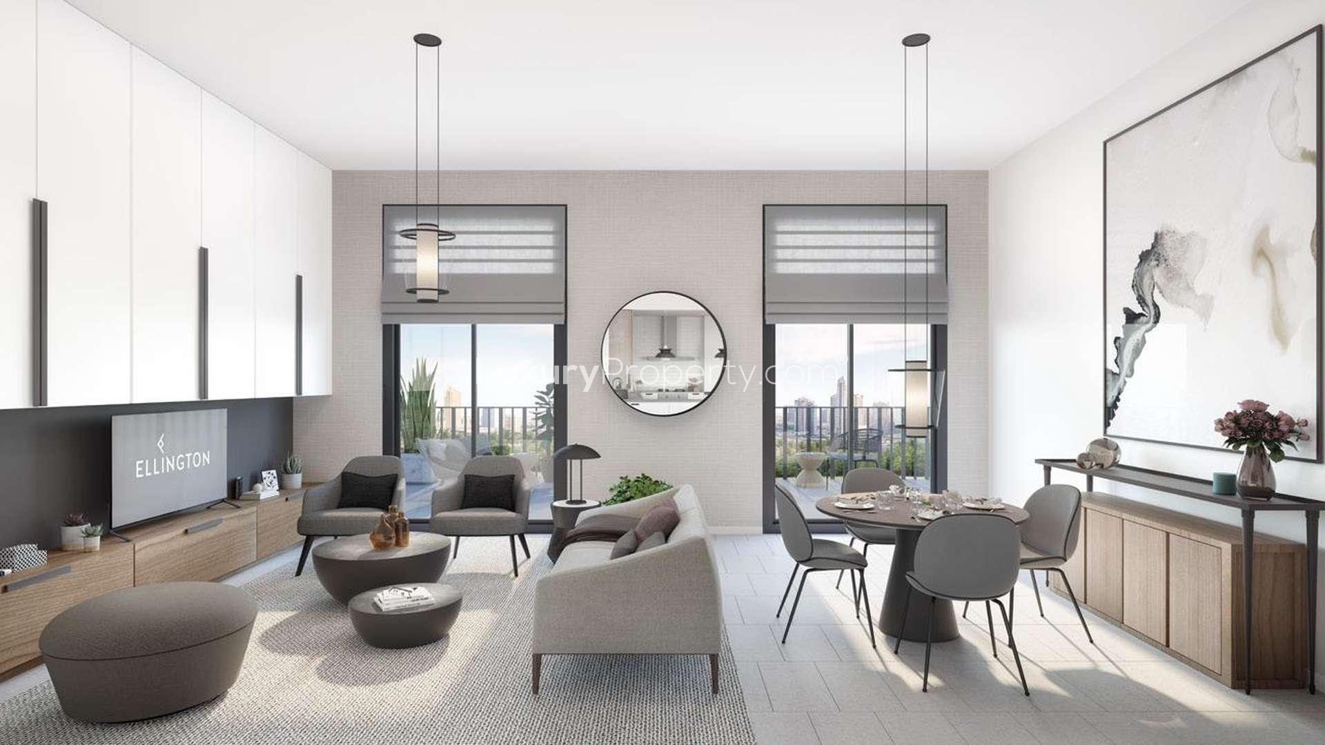 Outdoor terrace at Kensington Waters apartment, Meydan, with seating and garden views