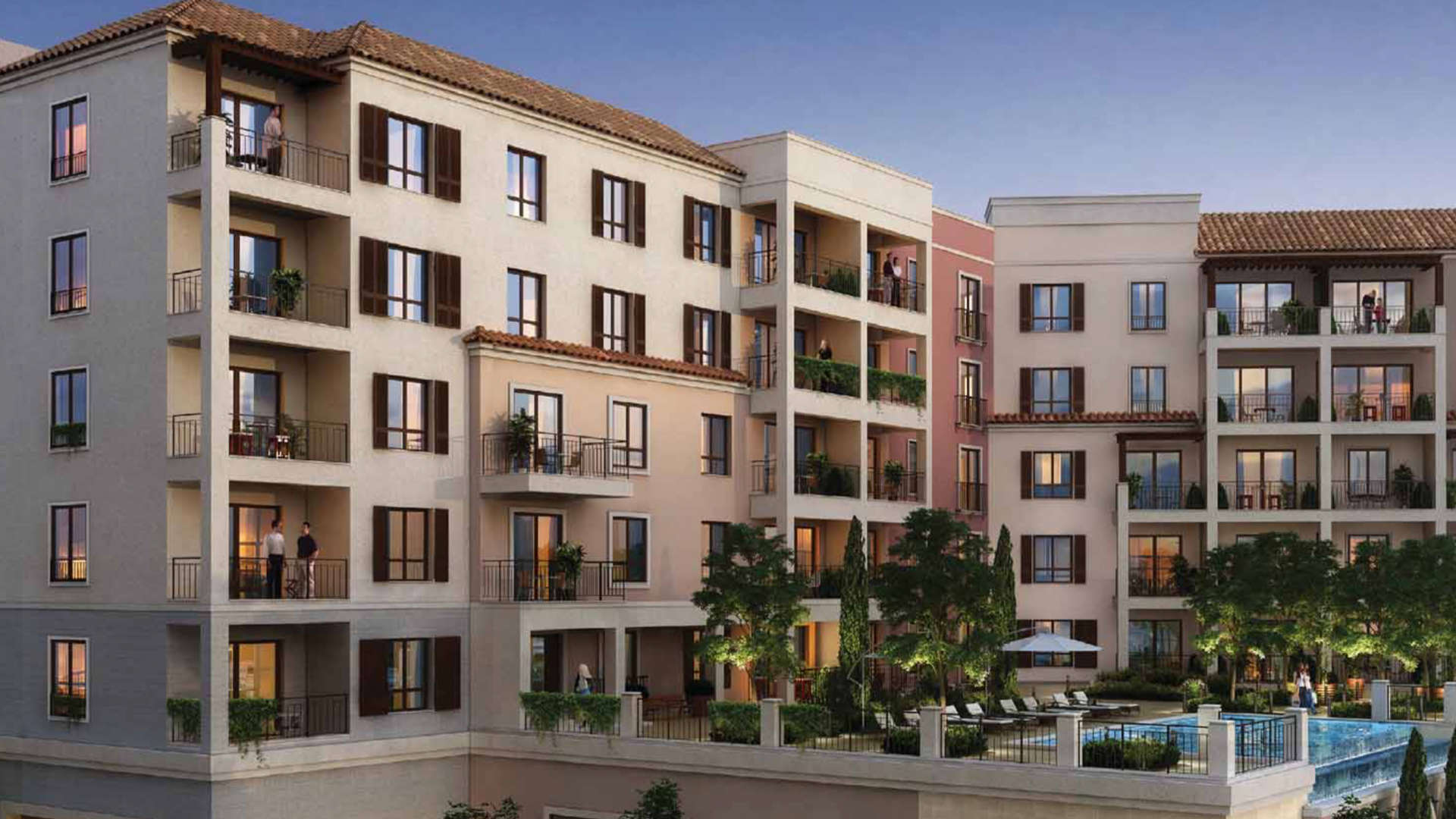 Elegant La Mer apartment building with balconies, lush landscaping, and vibrant community atmosphere