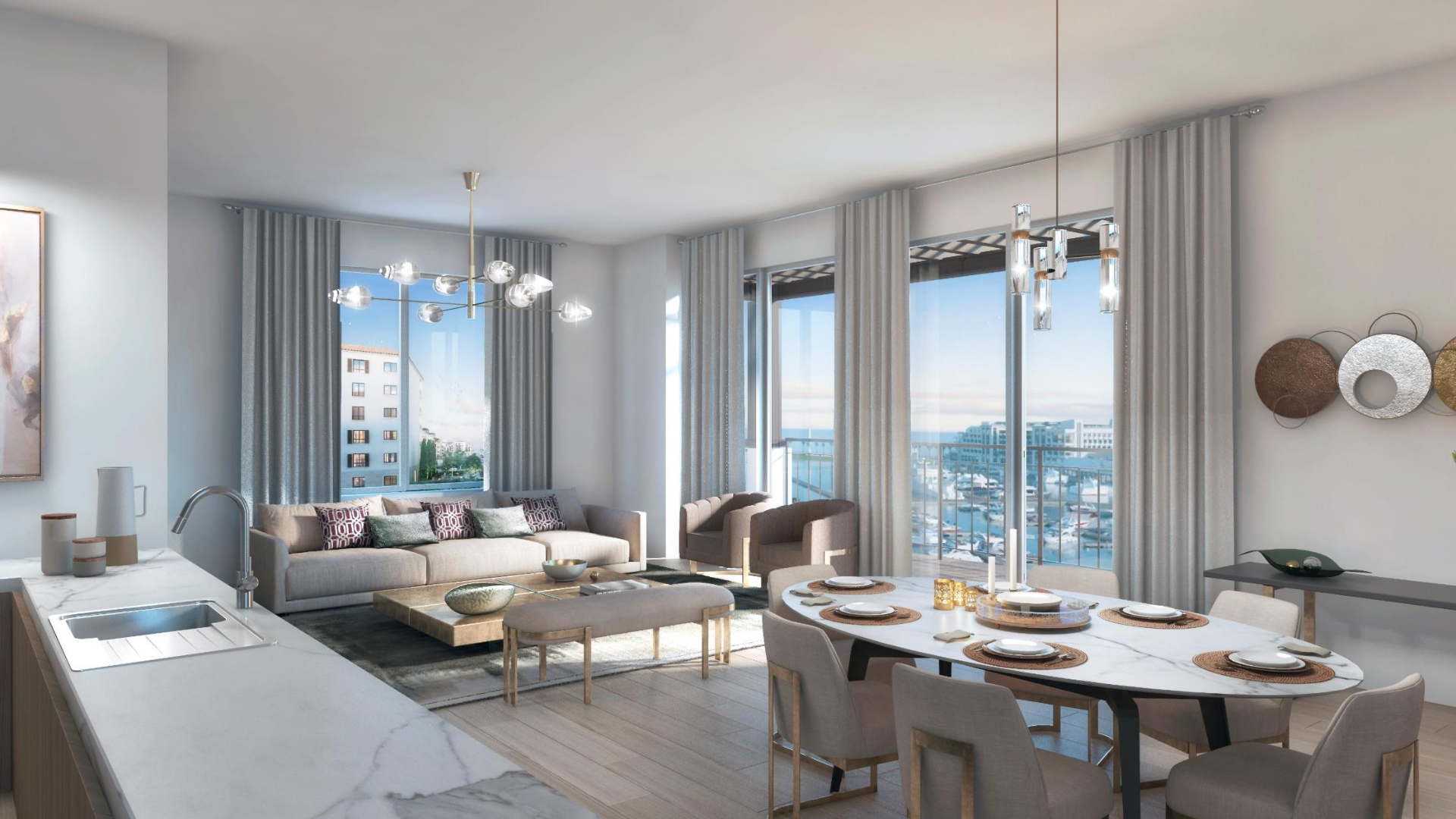Luxurious living room with dining area and stunning Arabian Gulf view at La Mer Apartment