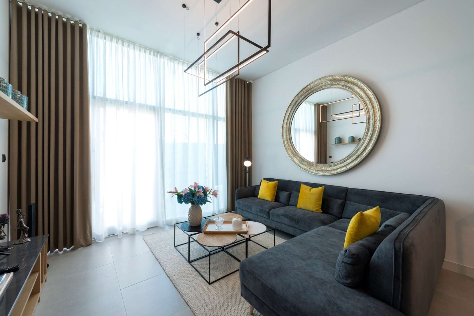 High-floor La Riviera apartment living room with modern decor, Jumeirah Village Circle